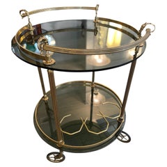 Round brass and smoked glass trolley from the 1970s
