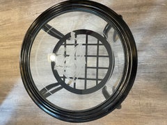 Paolo Buffa, round coffee table, made of ebonized wood and screen-printed glass, 1940