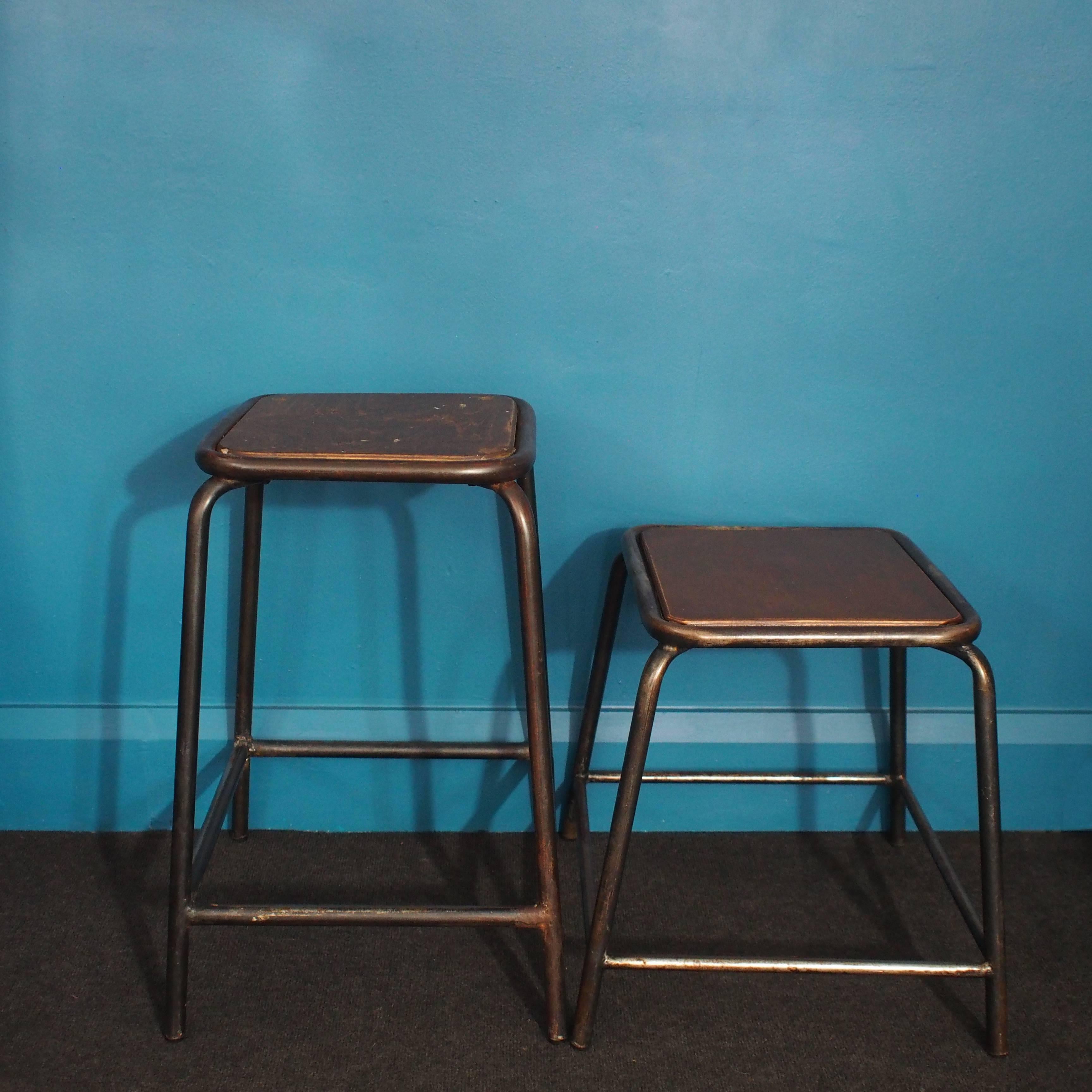 Hand-built tubular steel Industrial stools with their original plywood seats.
Four stools: 60.5 cm tall, seat 34 cm sq, base 43 cm sq.
Two stools: 46 cm tall, seat 35.5 cm sq, base 46 cm sq.

Free UK shipping (postcode dependant) is offered for