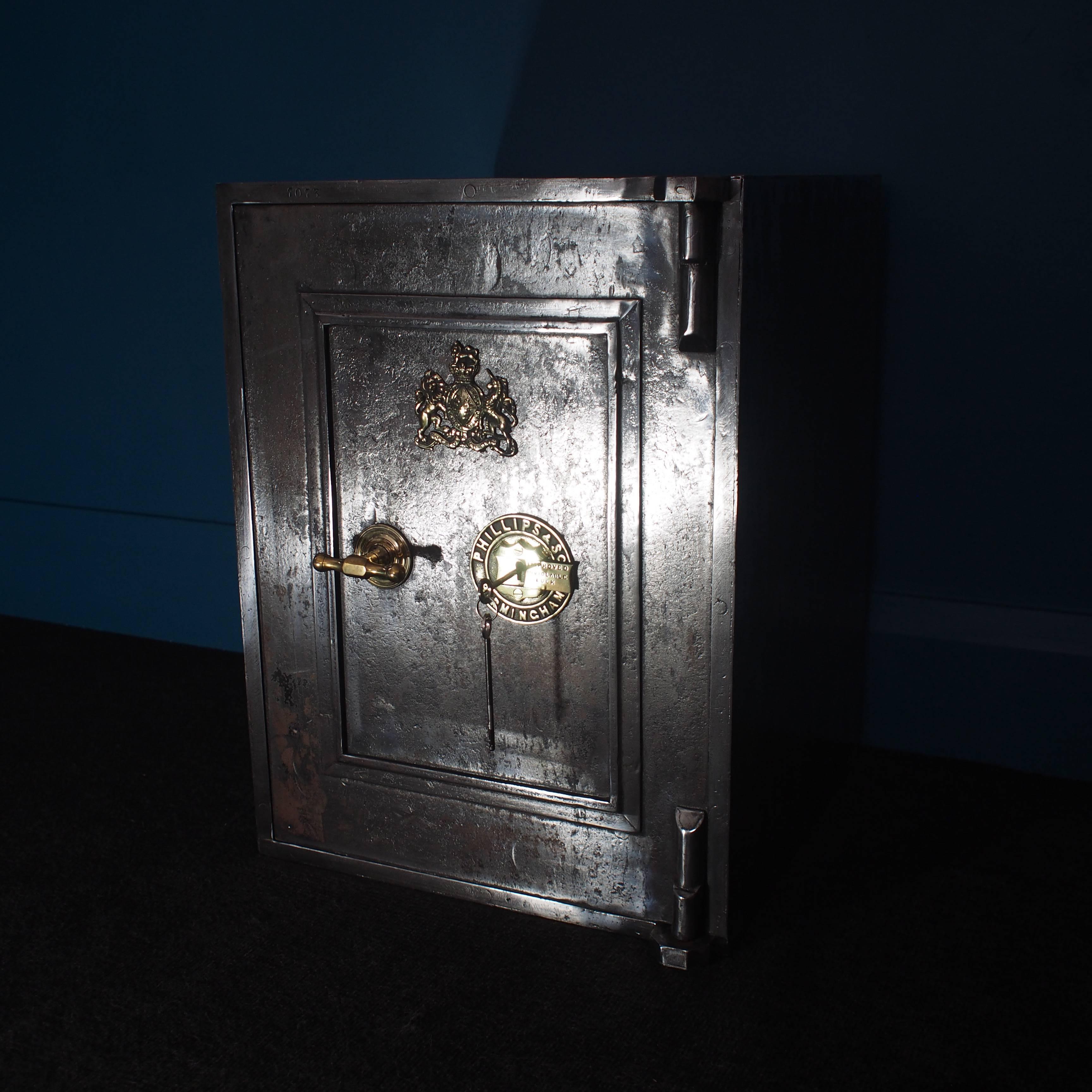 Antique safe by Phillips & Son, Birmingham, UK with polished brass Royal coat of arms plaque, lock and handle. Complete with two keys for its outer inviolable lock. The inner drawer has no key but it is unlocked.
The inner remains in its original