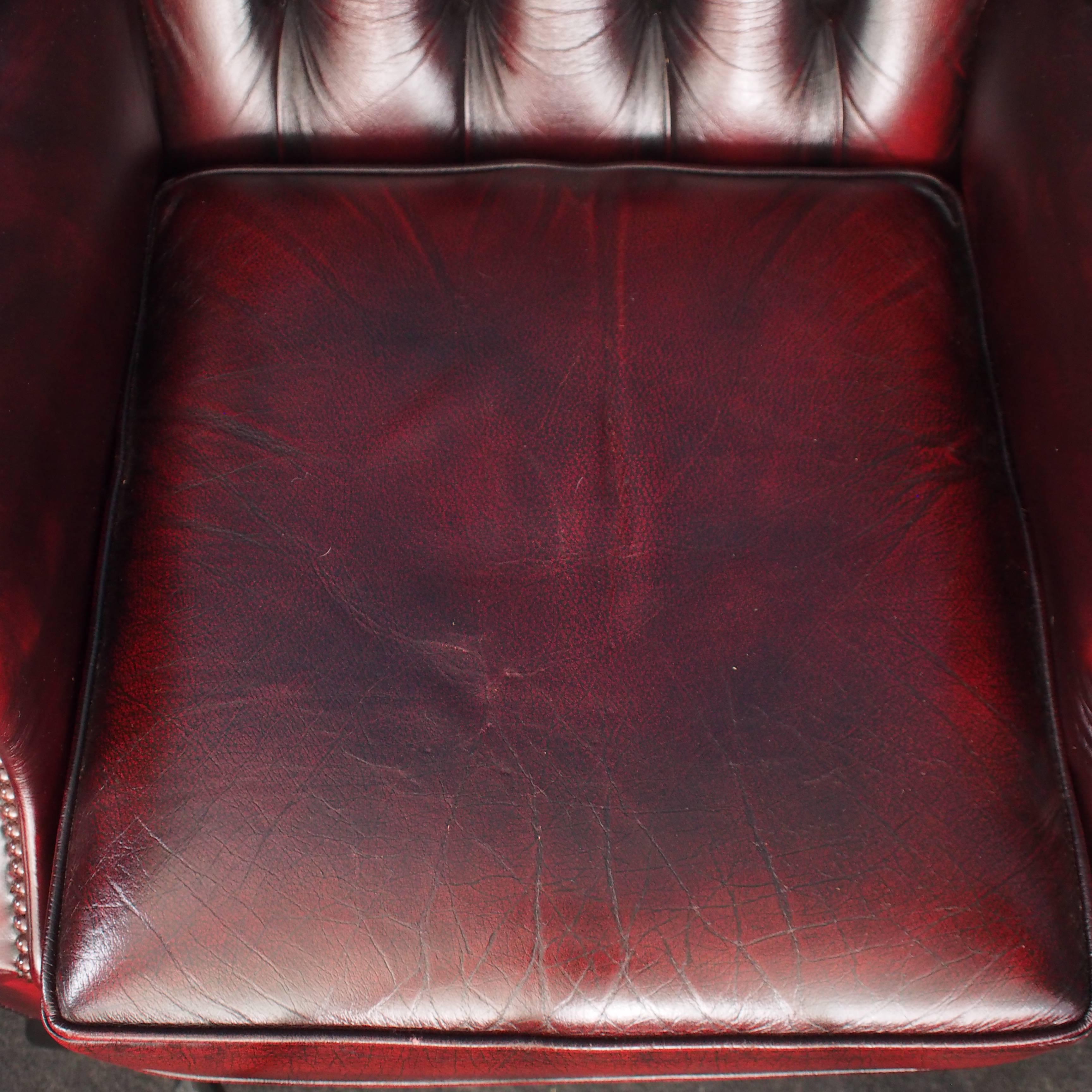 Late 20th Century English Vintage Oxblood Leather Wingback Chesterfield Armchairs, Pair, 1970s