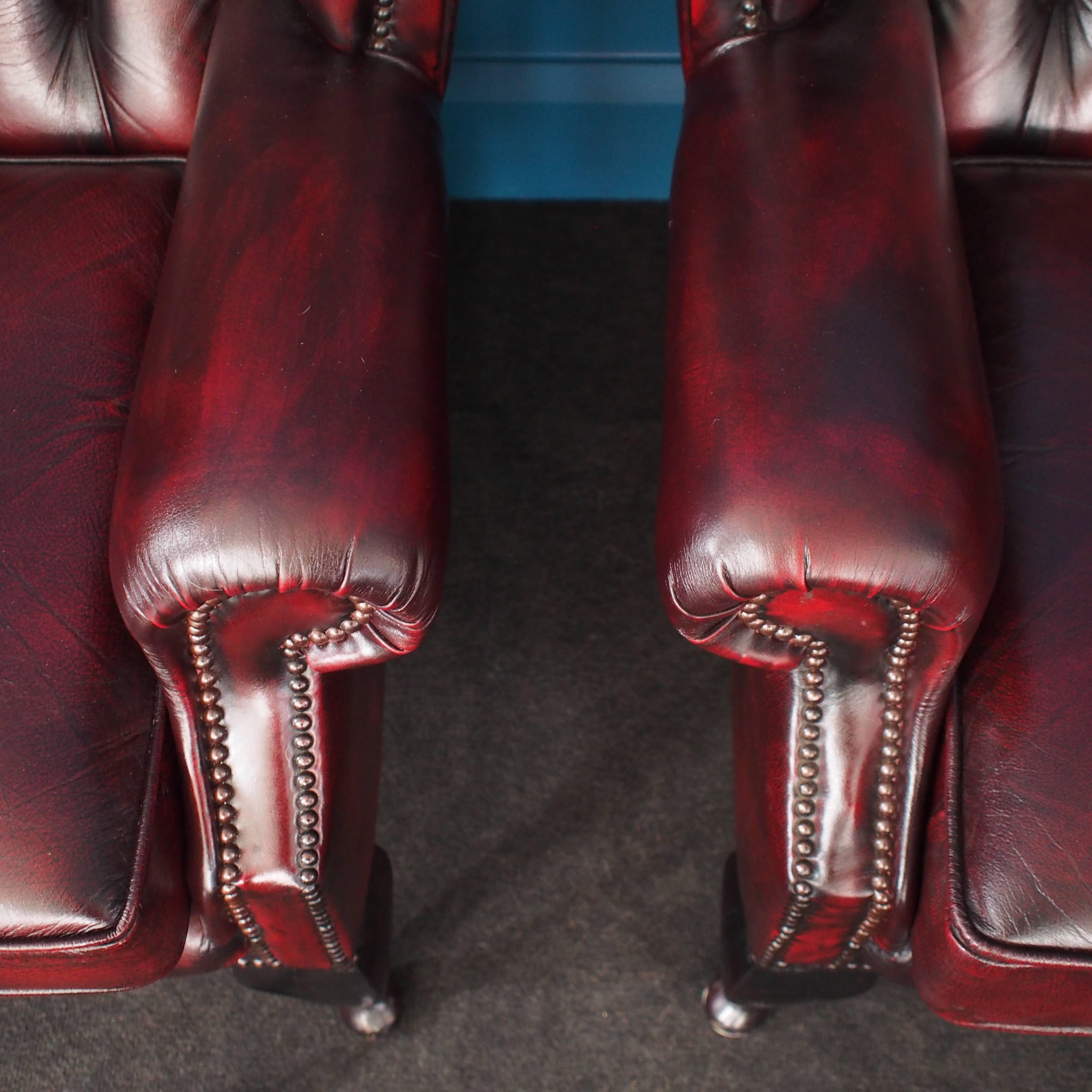 English Vintage Oxblood Leather Wingback Chesterfield Armchairs, Pair, 1970s 3