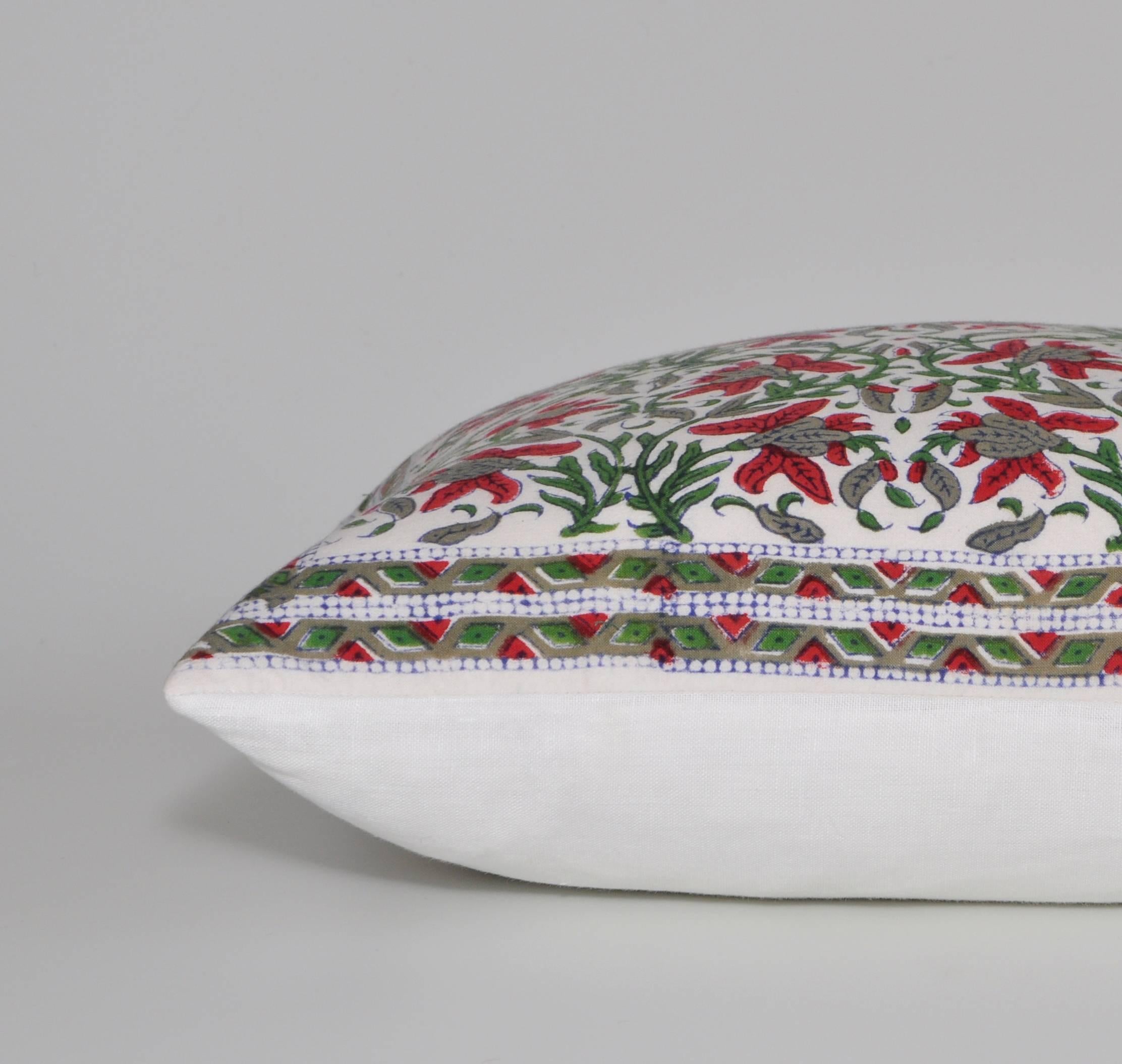 Beautiful ethnic pillow (cushion). Vintage fine Indian cotton backed in crisp Irish linen. An exquisite pattern of stylized flower motifs delicately intertwined and spiralling upwards in a growing manner, framed by a matching decorative border.