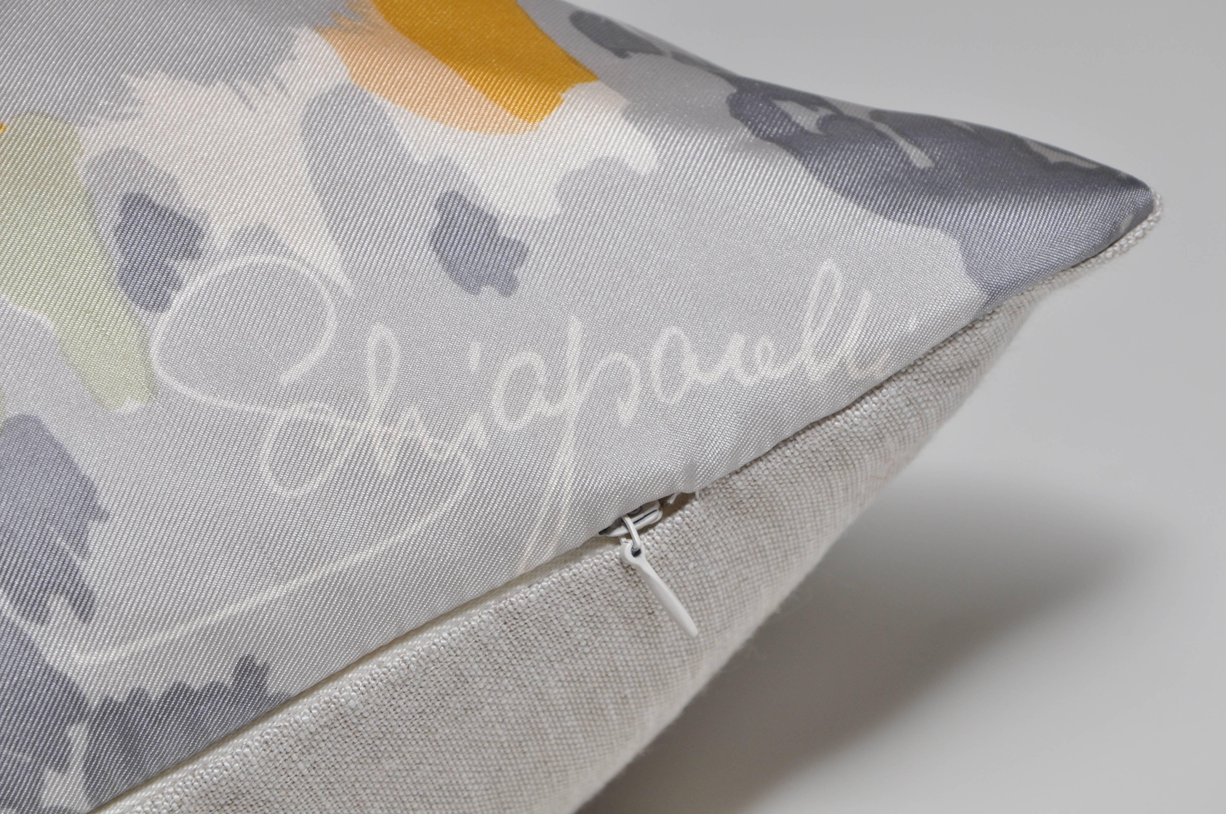 Custom-made one-of-a-kind luxury cushion (pillow) created from a rare vintage silk Schiaparelli scarf, in an unusual camouflage print originally with hand rolled edges. Featuring the ‘Schiaparelli’ signature placed elegantly in bottom right corner.