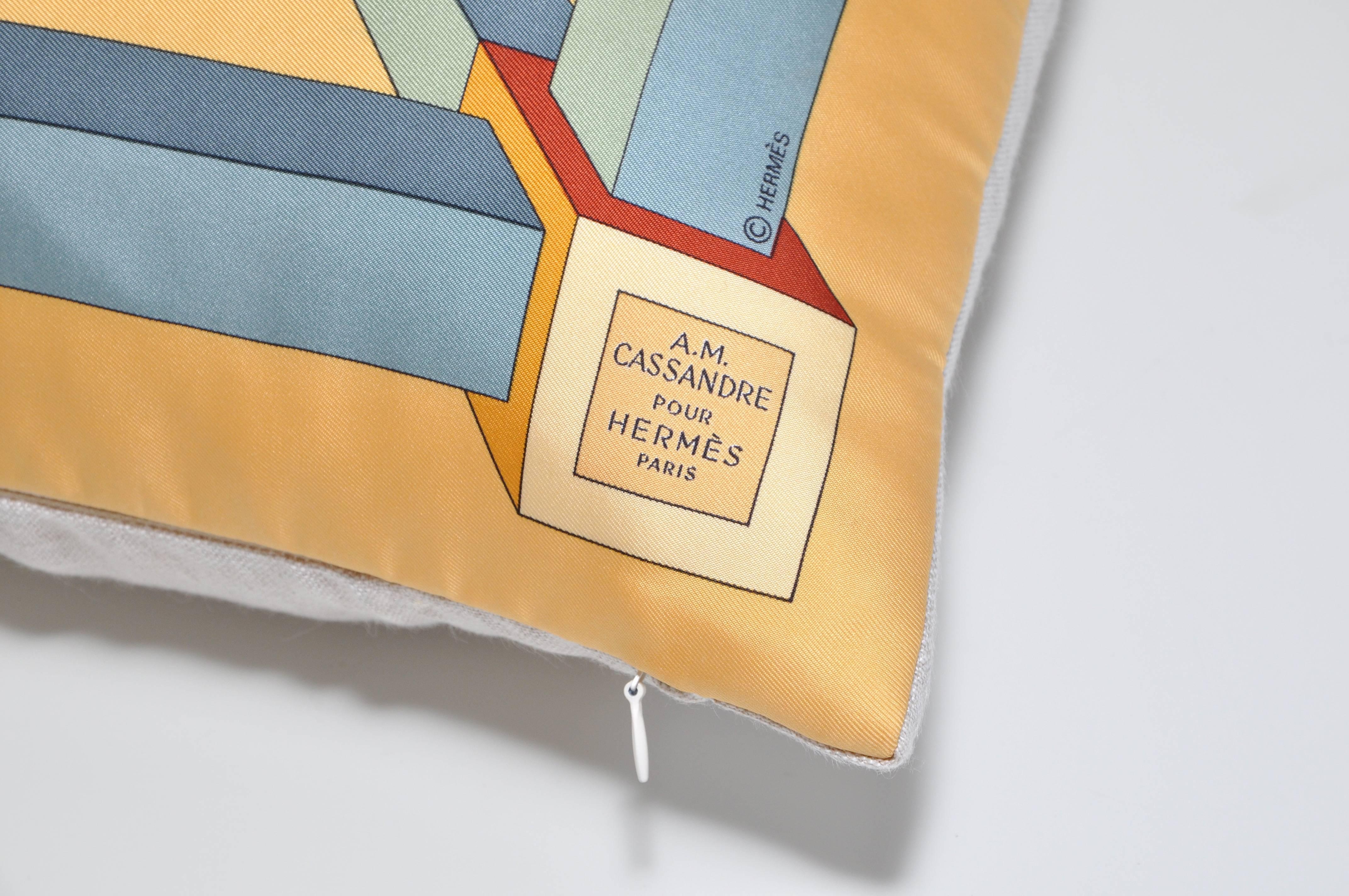 The ‘crème de la crème’ of scarves, this beauty is a one-of-a-kind custom-made luxury cushion (pillow) from an exquisite vintage silk Hermes fashion scarf designed by French artist Adolphe Mouron Cassandre in 1951. Cassandra was a prominent pre-war