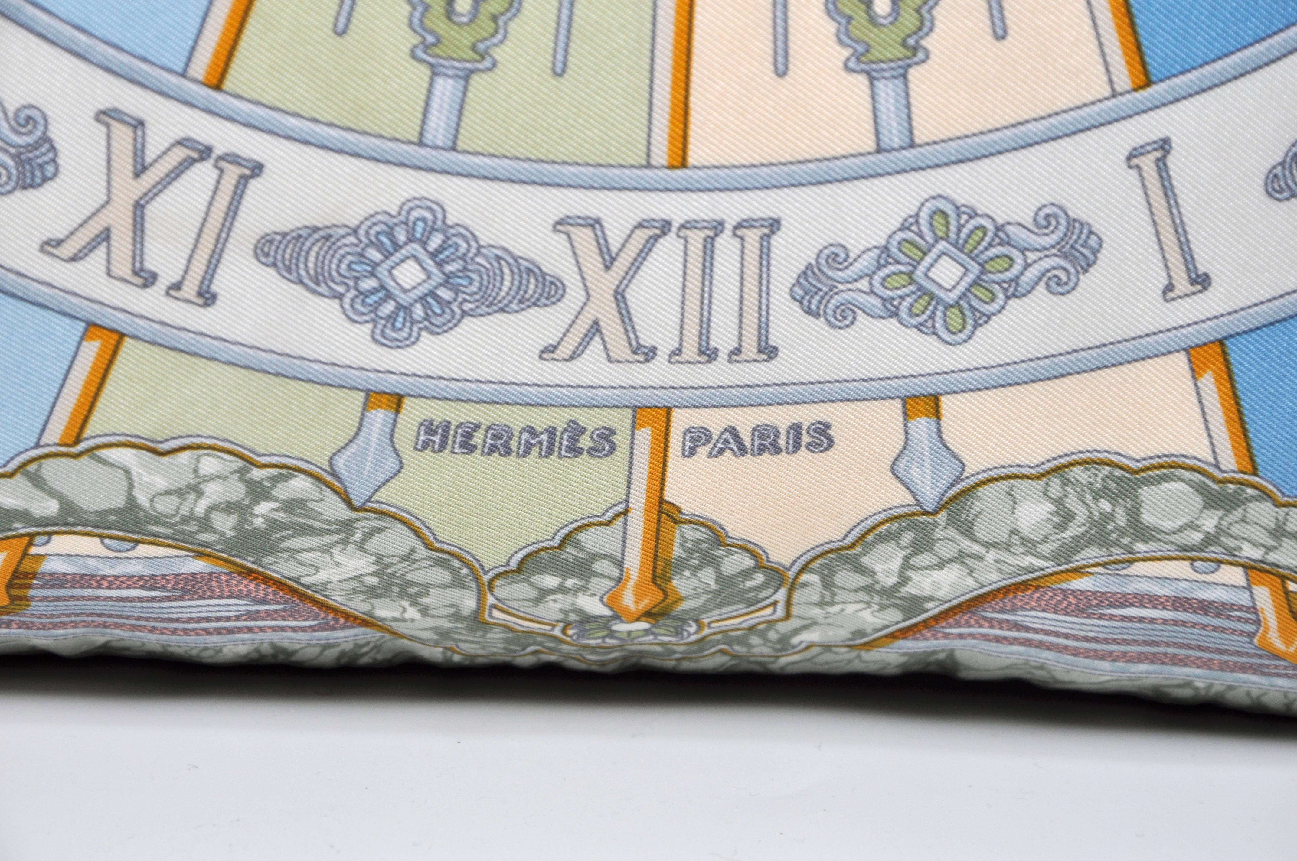 The ‘crème de la crème’ of scarves, this beauty is a one-of-a-kind custom-made luxury cushion (pillow) from an exquisite vintage silk celestial themed Hermes fashion scarf designed by Joachim Metz in 1994. Originally named as ‘Gloria Soli’, the