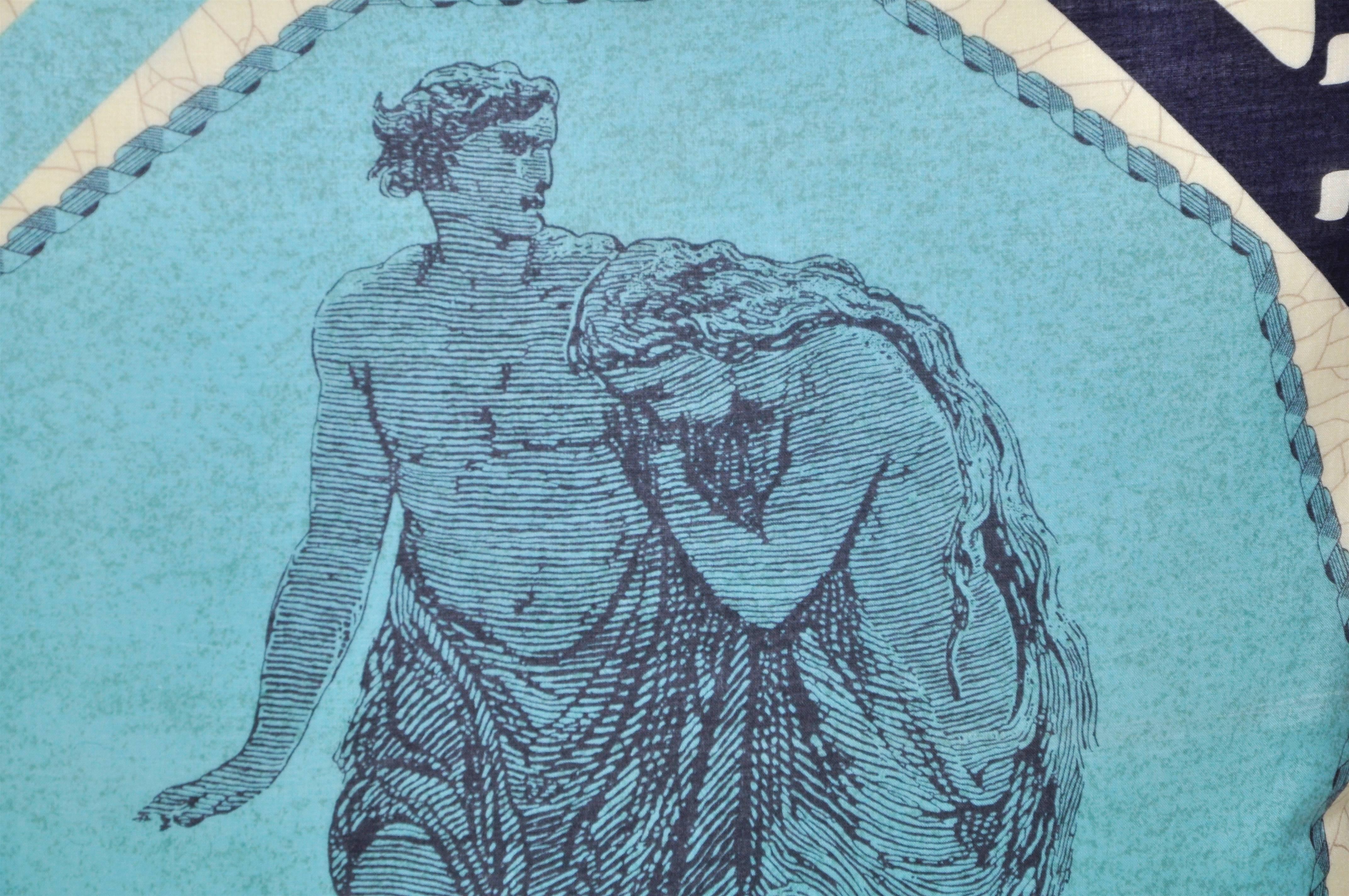 Custom-made one-of-a-kind luxury cushion (pillow) created from an extremely rare Jean-Paul Gaultier vintage garment in a striking palette. The unusual design illustrates a figurative scene in classical style in a vibrant blue and bold black, the