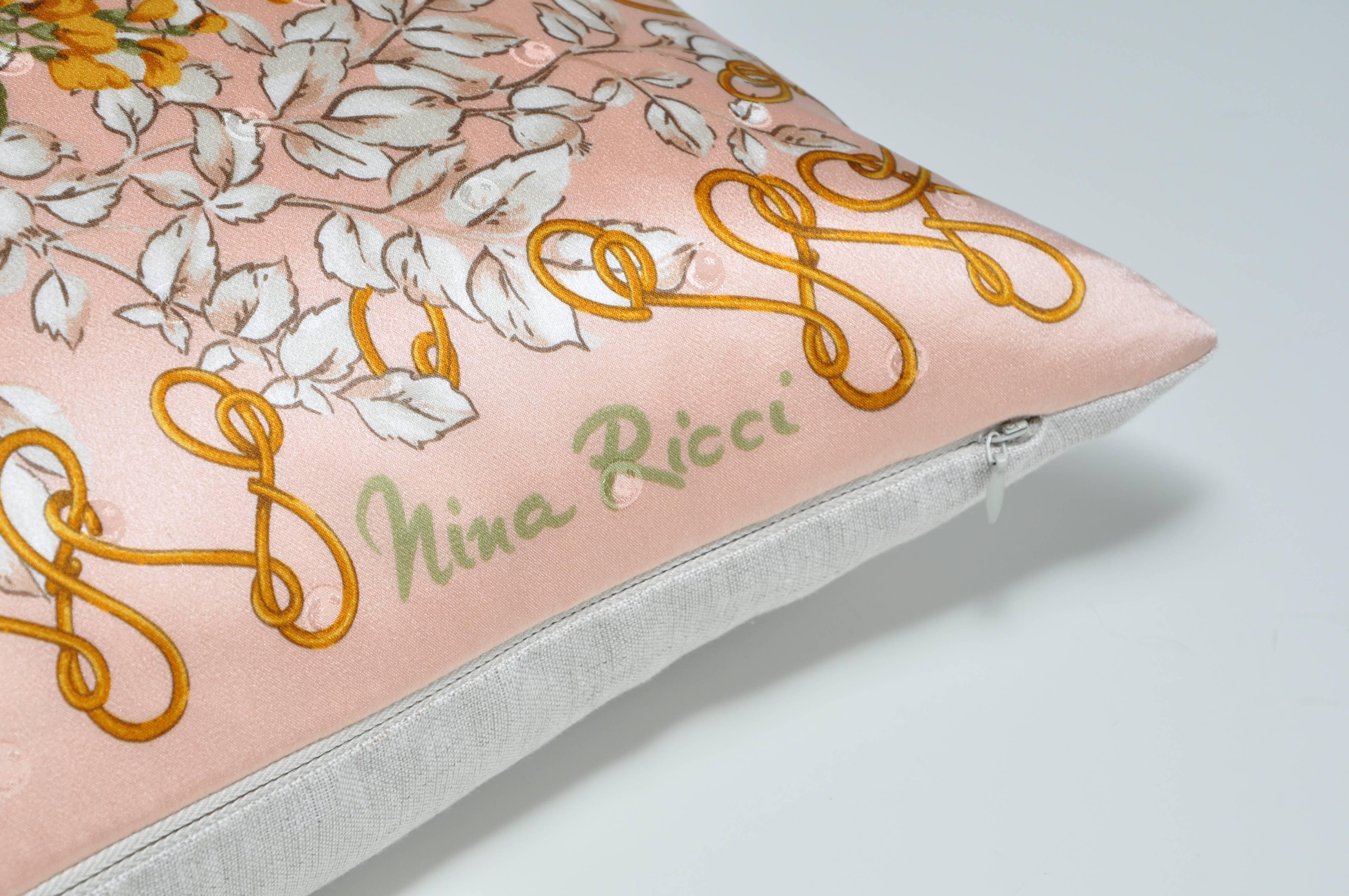 Custom-made one-of-a-kind luxury cushion created from a beautiful vintage silk Nina Ricci fashion scarf in an exquisite floral pattern. The most sumptuous soft to the touch silk in a soft, feminine peachy pink. A dainty floral picture of foliage and