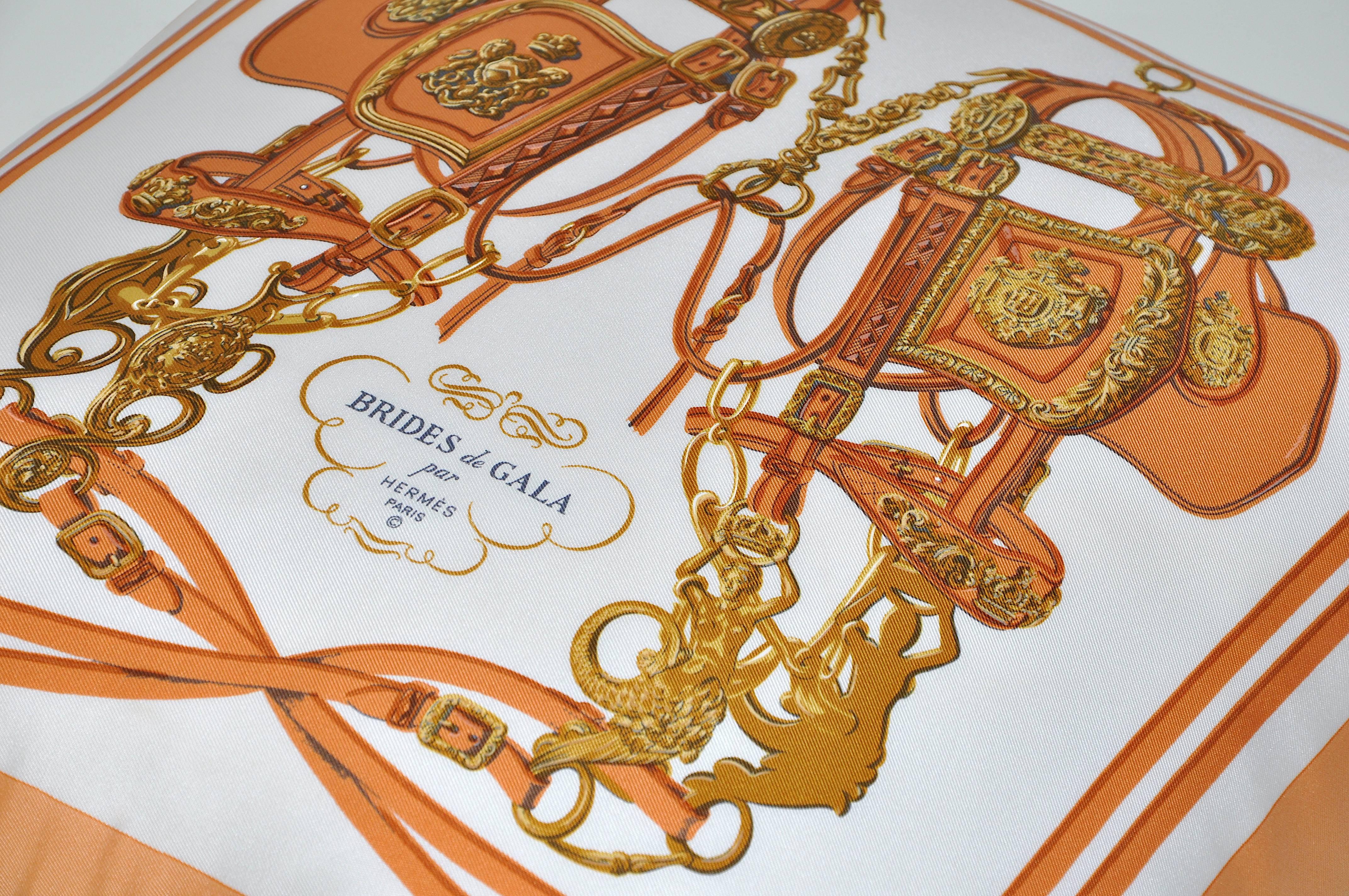 The ‘crème de la crème’ of scarves, this beauty is a one-of-a-kind custom-made cushion (pillow) created from an exquisite vintage silk Hermes fashion scarf in their striking equestrian design ‘Brides de Gala’ designed by Hugo Grygkar in 1957.

The