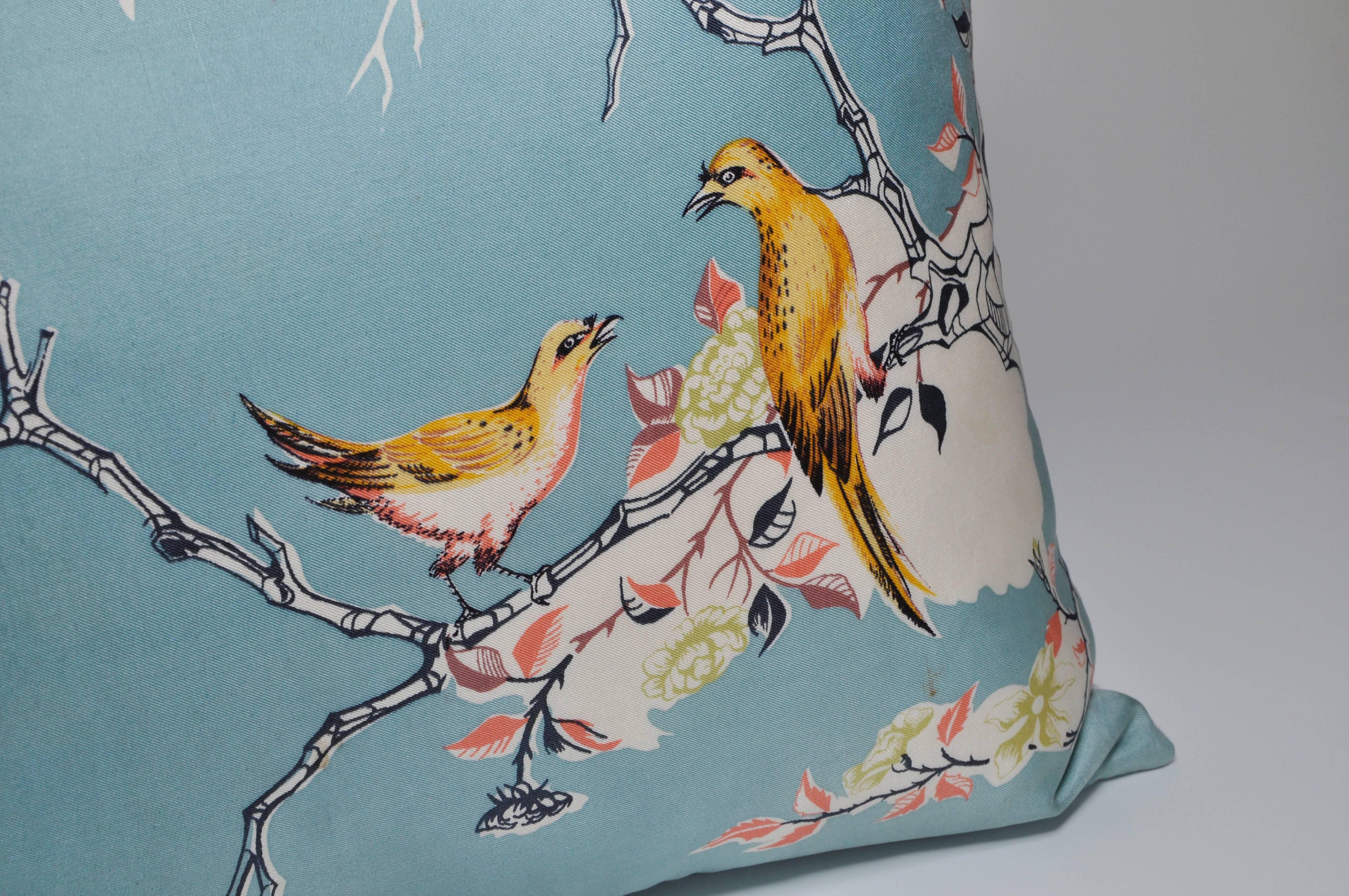 Custom-made one-of-a-kind luxury cushion (pillow) created from an extremely rare vintage silk Liberty of London fashion scarf in a soft blue with an exquisite design illustrating birds. Sitting on branches in amongst wild shrubbery with delicate