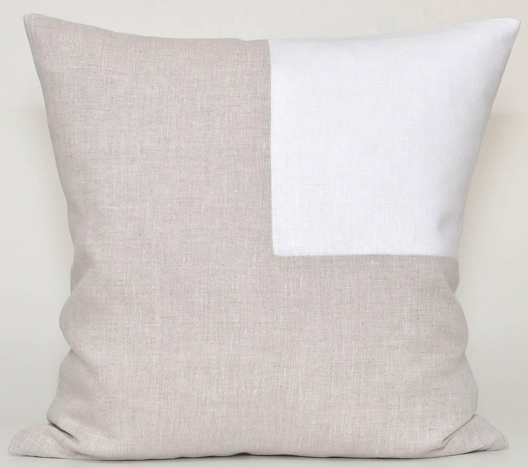 A pair of complimenting custom-made luxury contemporary pillows (cushions) of 100% pure Irish linen. A signature combination of classic pristine white matched with traditional oatmeal. The oatmeal is a beautiful mottled color which is the mixture of