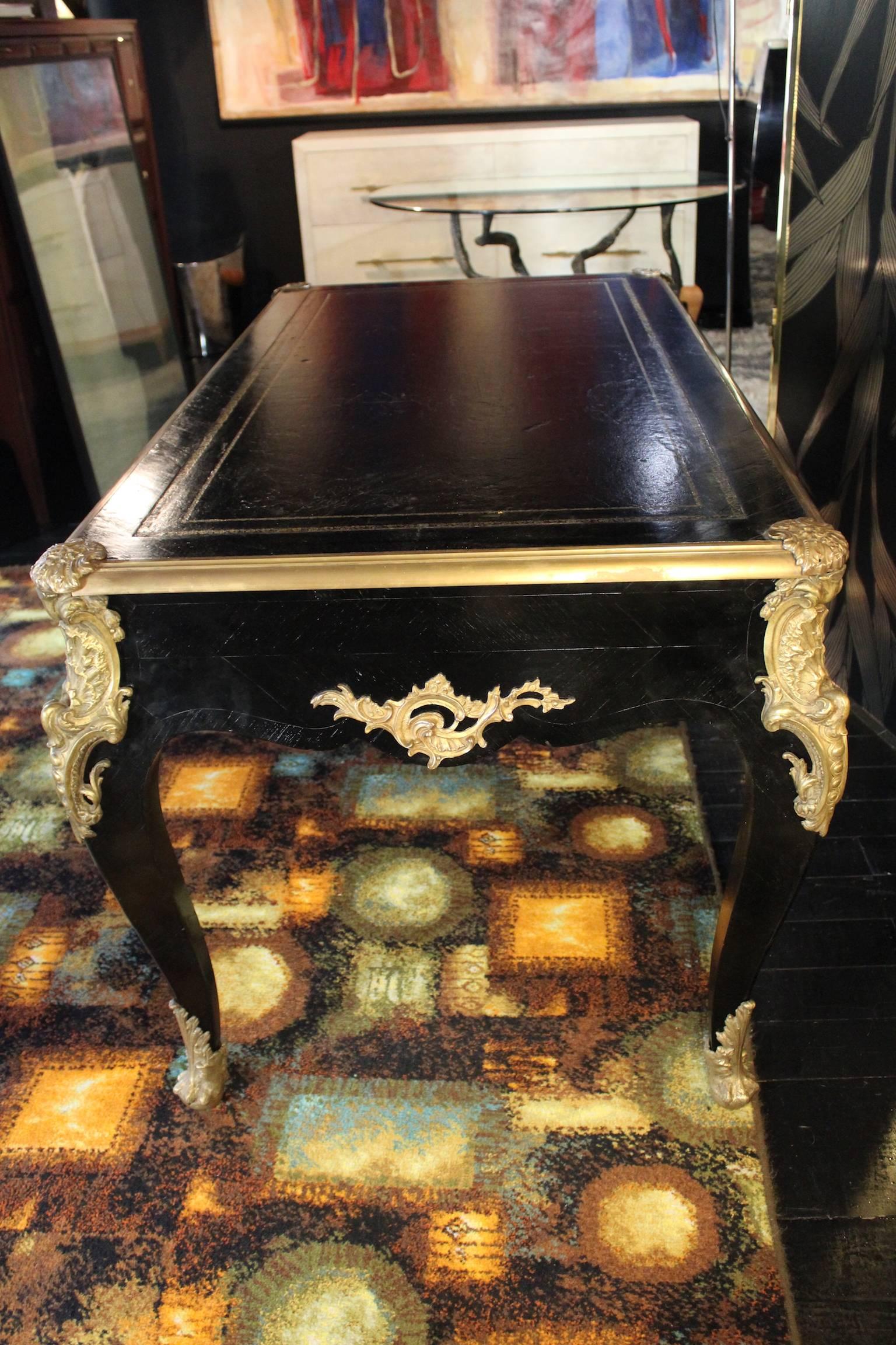 black and gold writing desk