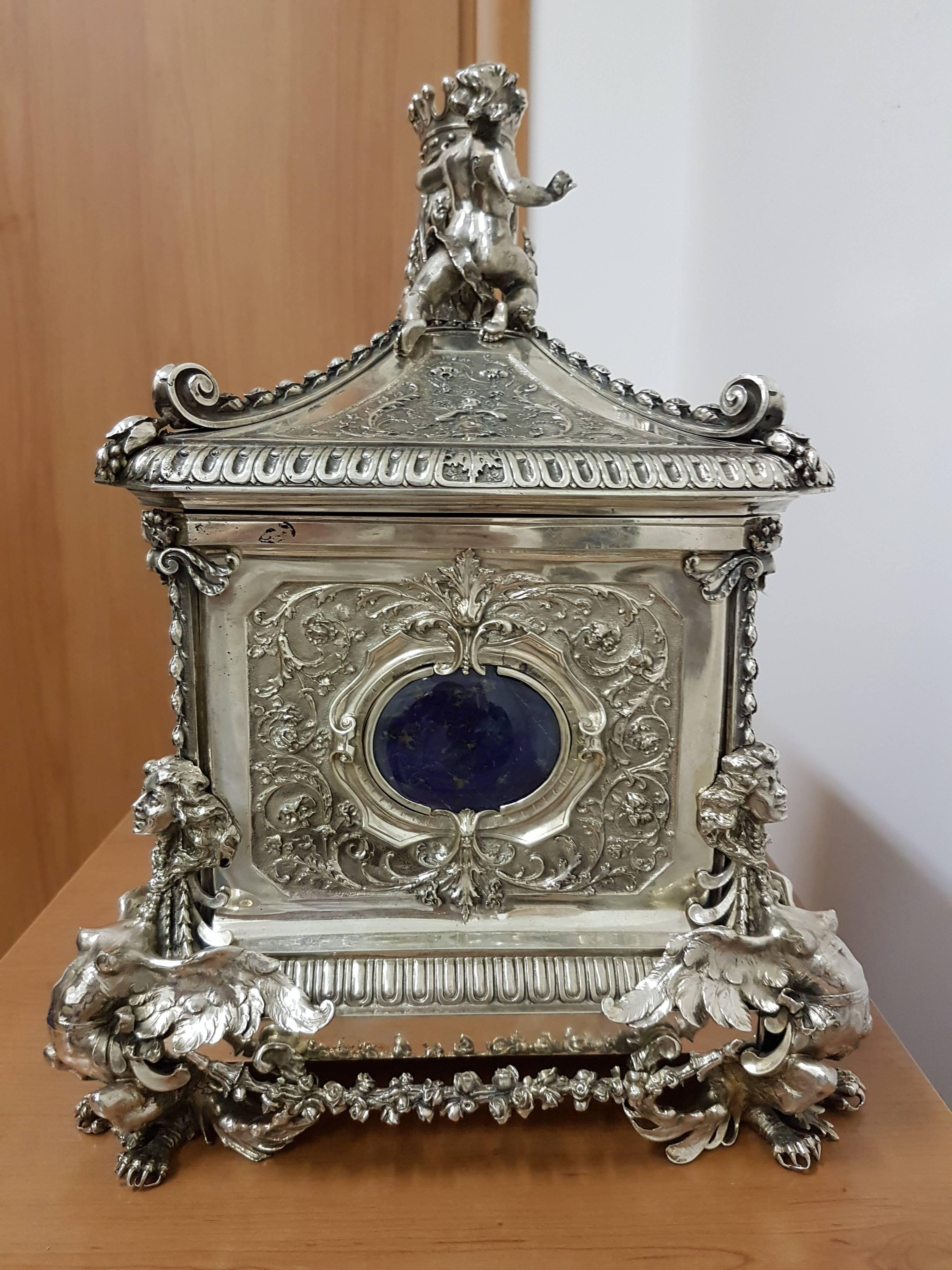 A silver coffer with lapis lazuli plaques signed by Ventrella, Rome, 20th century.


 