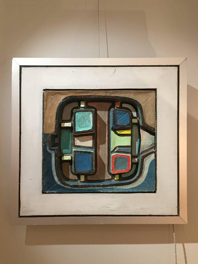 A most unusual polychrome papier mâché picture, framed in a wooden and brushed aluminium square frame, the relief surface incorporating a light.
Follower of Jean Dubuffet (1901-1985)
France, circa 1960.
Measures: 68 cm wide by 65 cm high.
Can be