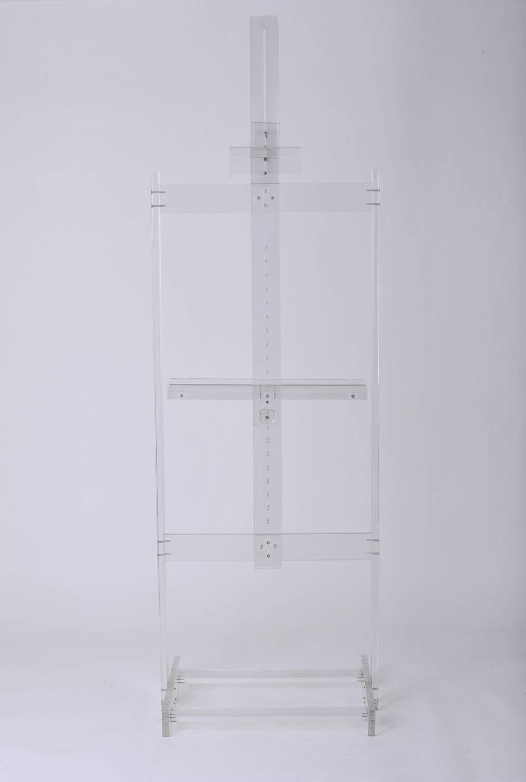 A monumental perspex vertical easel, fully adjustable. It can support a very large picture, or flat screen television,
France, circa 1970.