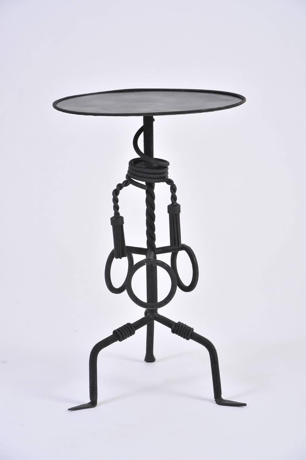 A unique wrought iron side table
France, circa 1970.