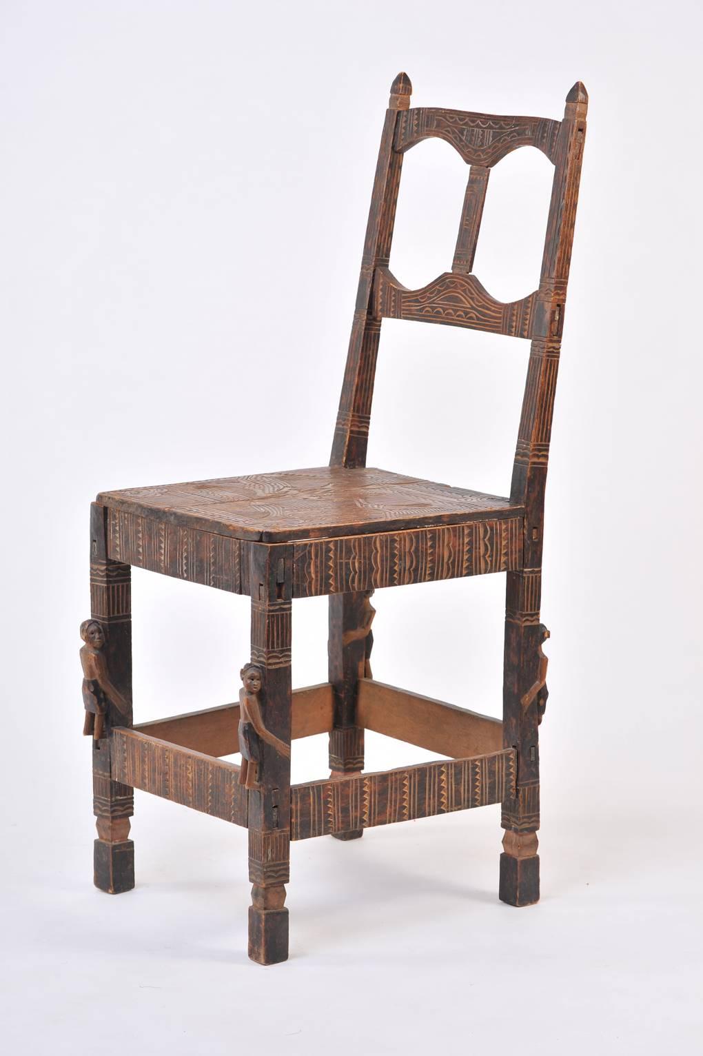 A matched pair of richly carved wood Chokwe chairs.
Congo and Northern Angola, 1940 to 1960.