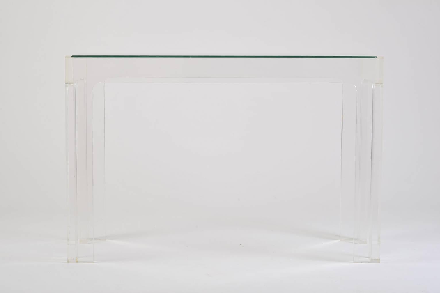 A high quality perspex and glass top rectangular console table, the design inspired by Chinese 18th century furniture
France, circa 1970.