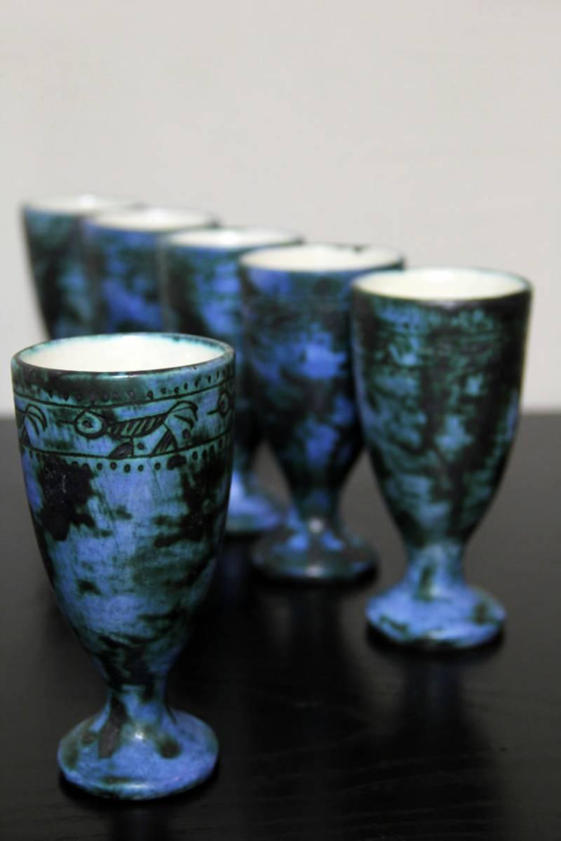 This French set of six sgraffito wine goblets was designed during the 1950s by Jacques Blin, one of the most important European ceramicists of the midcentury period. The goblets are made of hand shaped ceramic with blue glaze and decorated with
