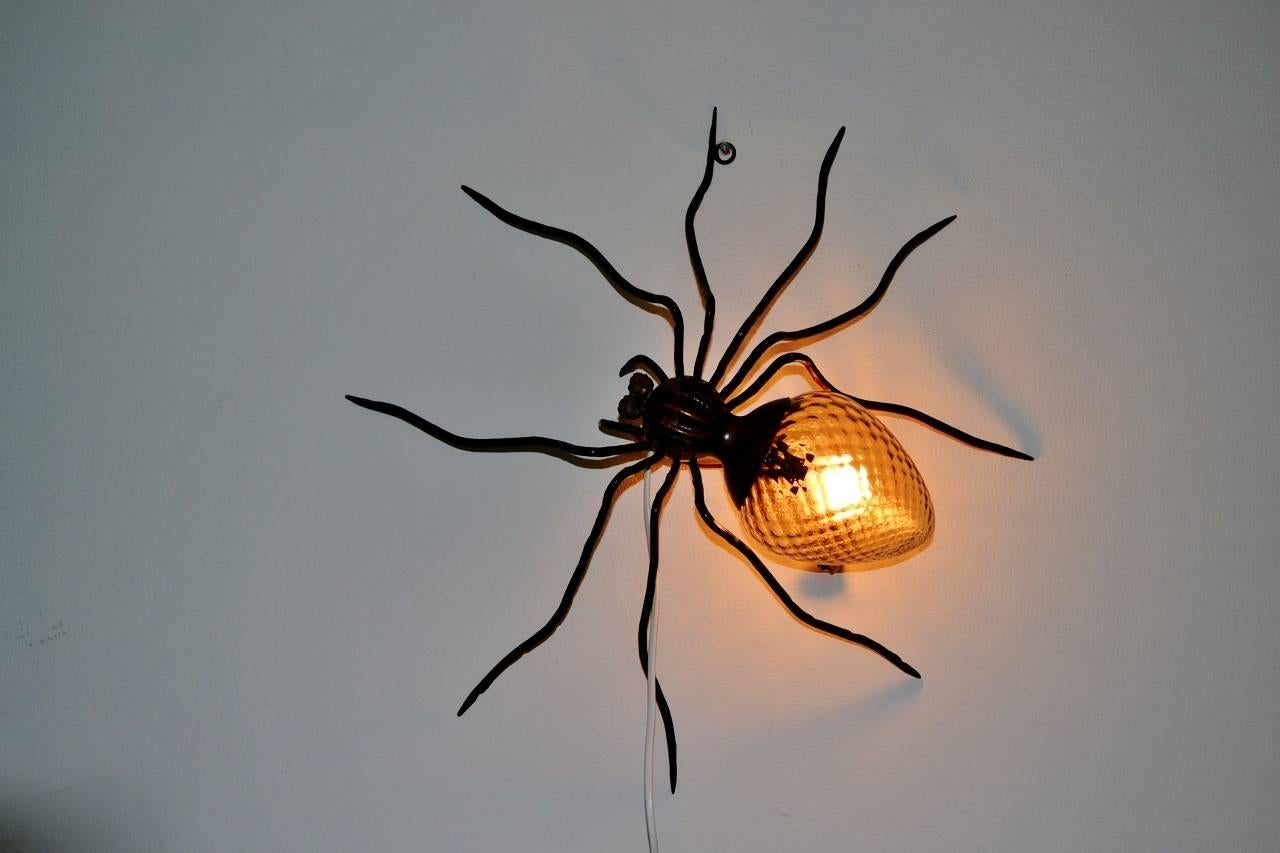 Gorgeous spider lamp, made in Italy in circa 1960s.
This lamp is a typical outdoor lamp mounted over the entrance door of Italian houses of the 1960s. Nowadays they are requested design objects to be used also indoor.
Made of solid iron (painted)