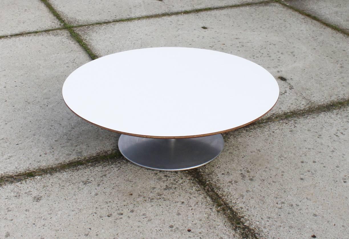 This classic piece is made of wooden top and stainless steel base. The table is easy to move around and it fits with many different styles which makes it very adjustable. 

Pierre Paulin and Artifort it is a long and prolific collaboration that