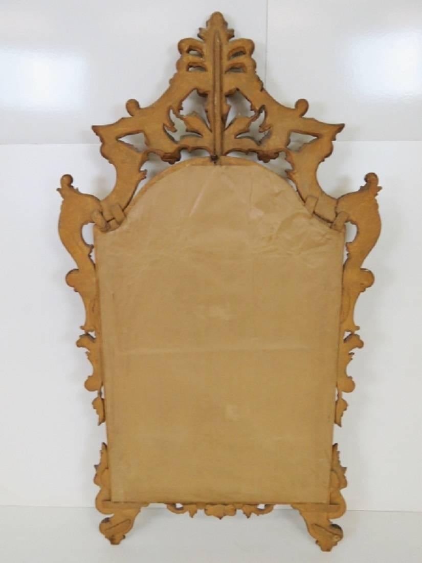 Gilt carved mirror.
