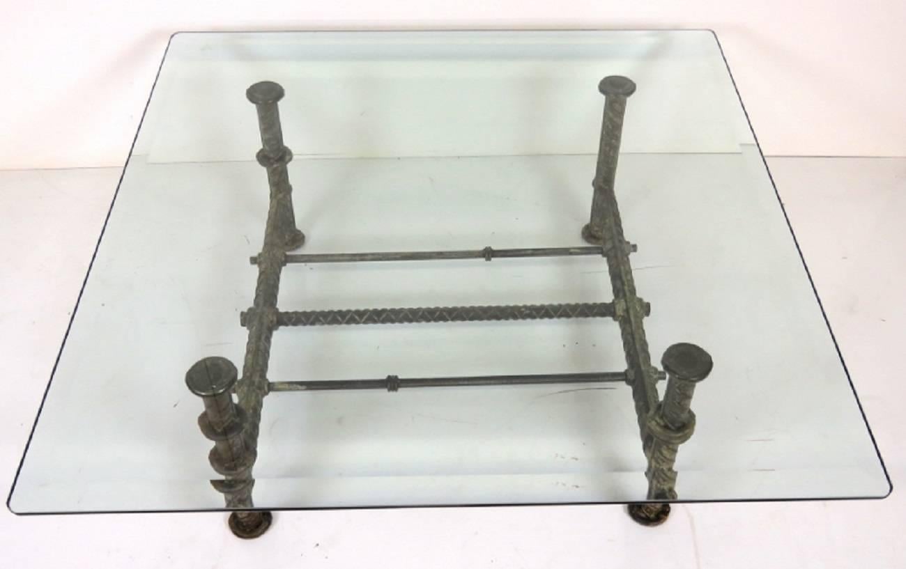 Table is iron and glass. Iron with distressed finish.