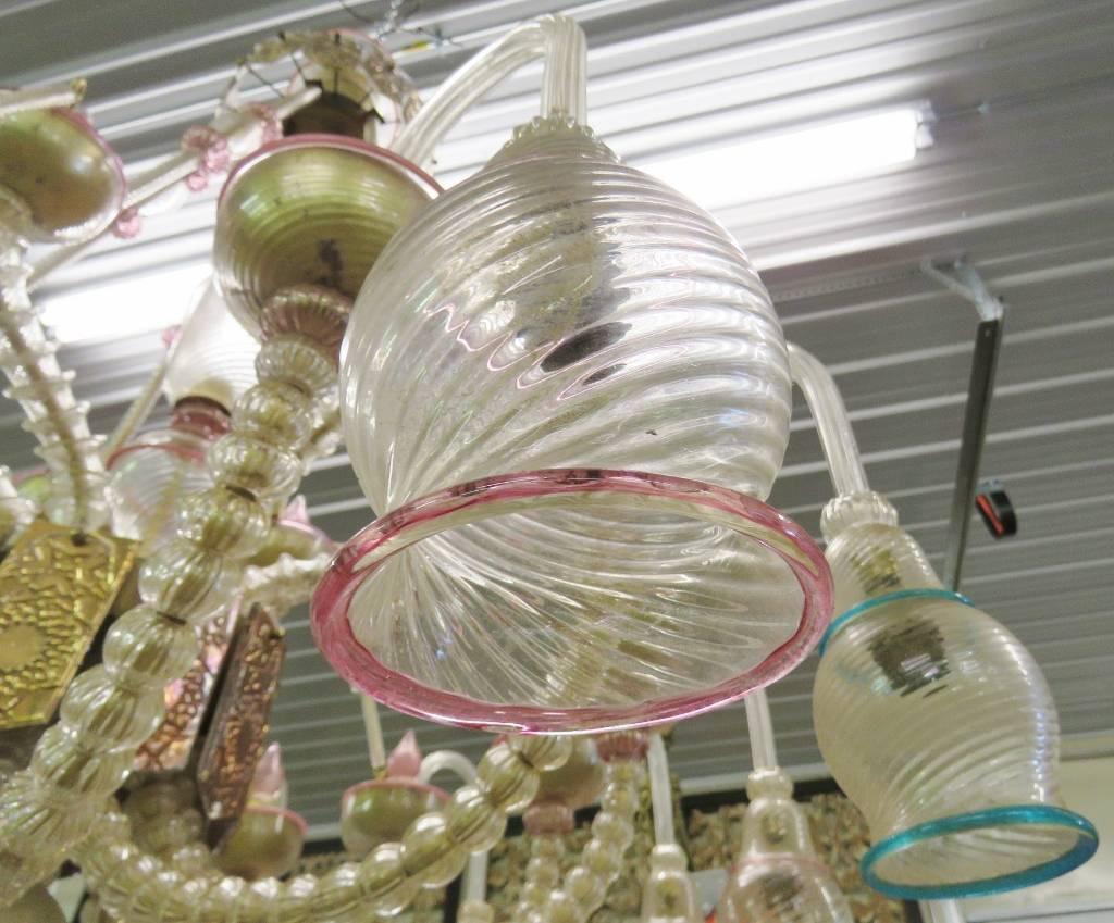 Clear Murano glass shades with pink and turquoise paint decoration. Gold painted metal medallions.