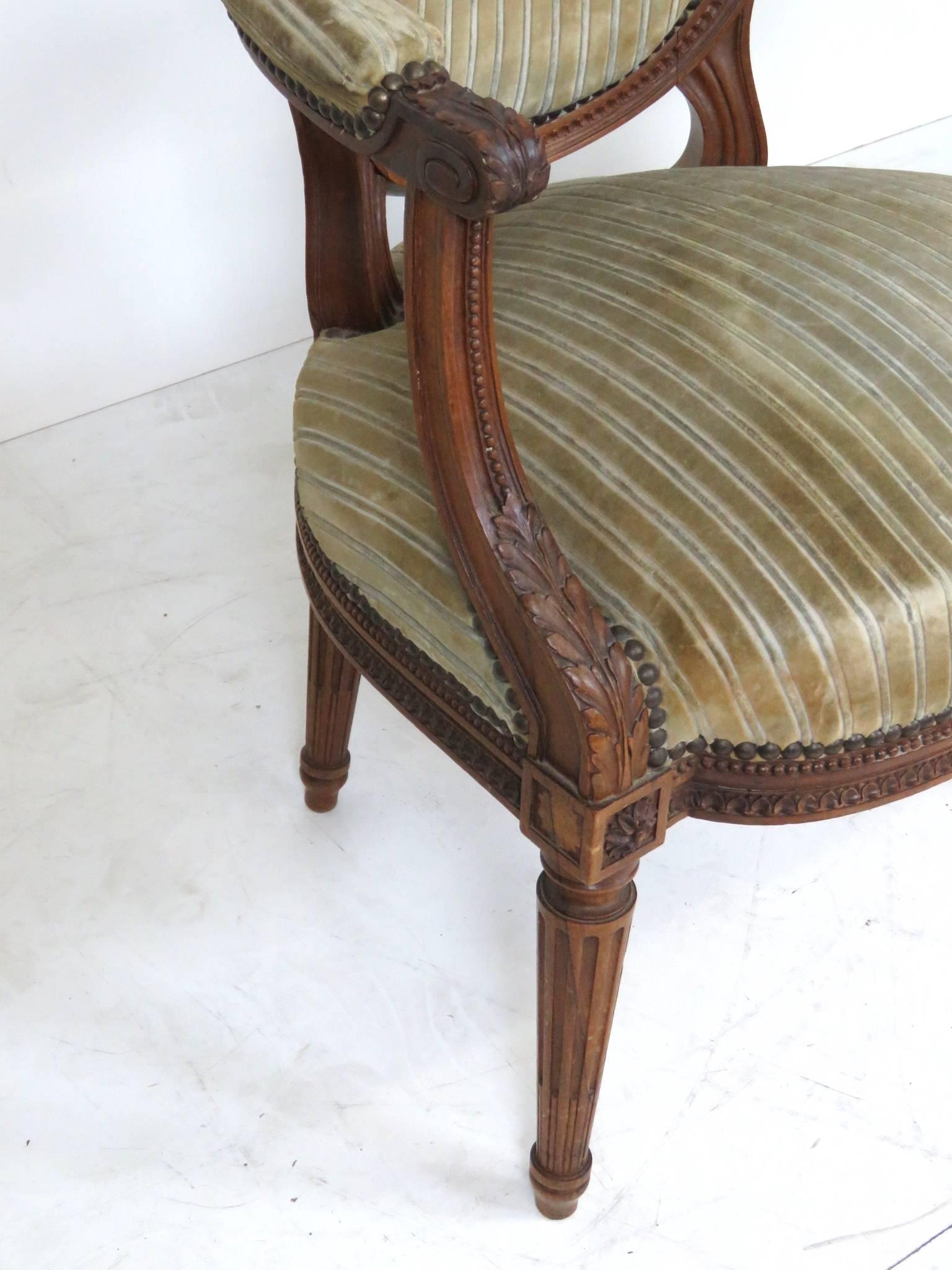 Pair of Antique Louis XVI Style Carved Walnut Fauteuils In Good Condition In Swedesboro, NJ