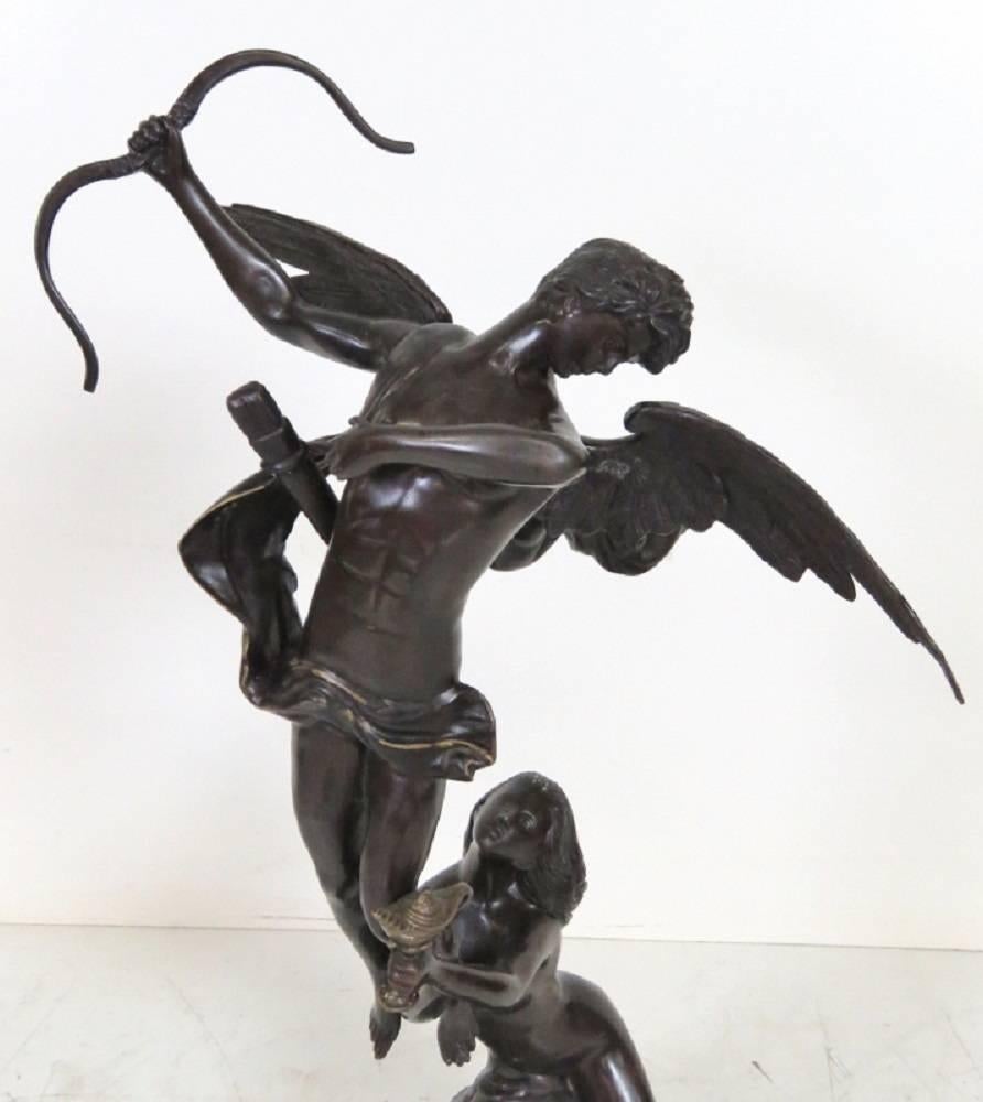 Bronze sculpture of an archer and maiden by Maitland Smith. Measures: 40