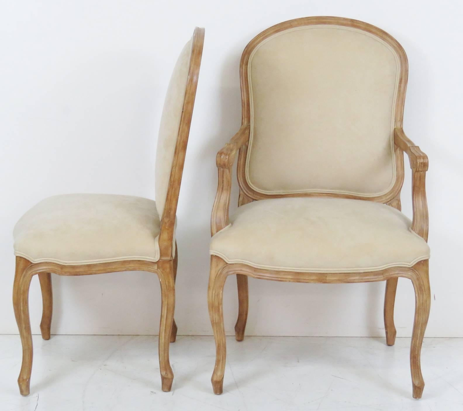 Carved frame with cream upholstered seats and backs. Includes two armchairs and six side chairs.