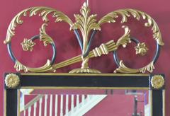 Regency Style Ebonized and Gilt Carved Mirror