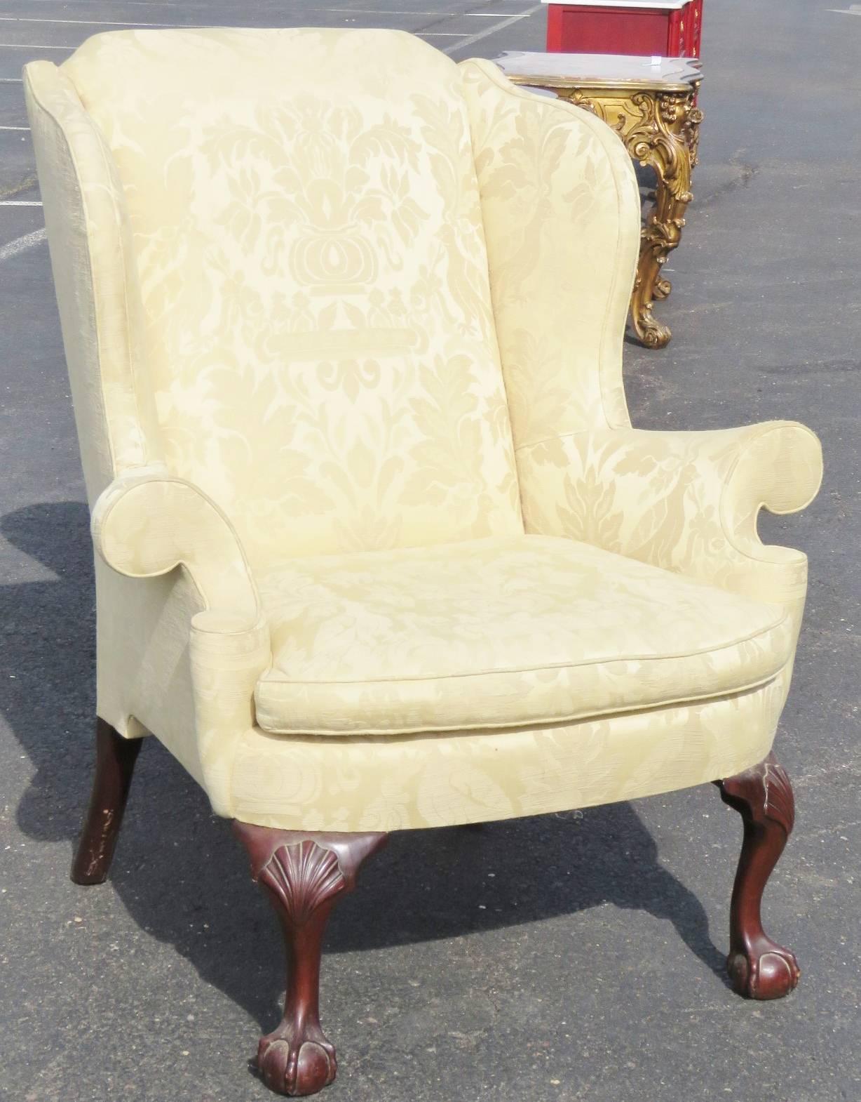 Carved ball and claw feet. Yellow damask upholstery.