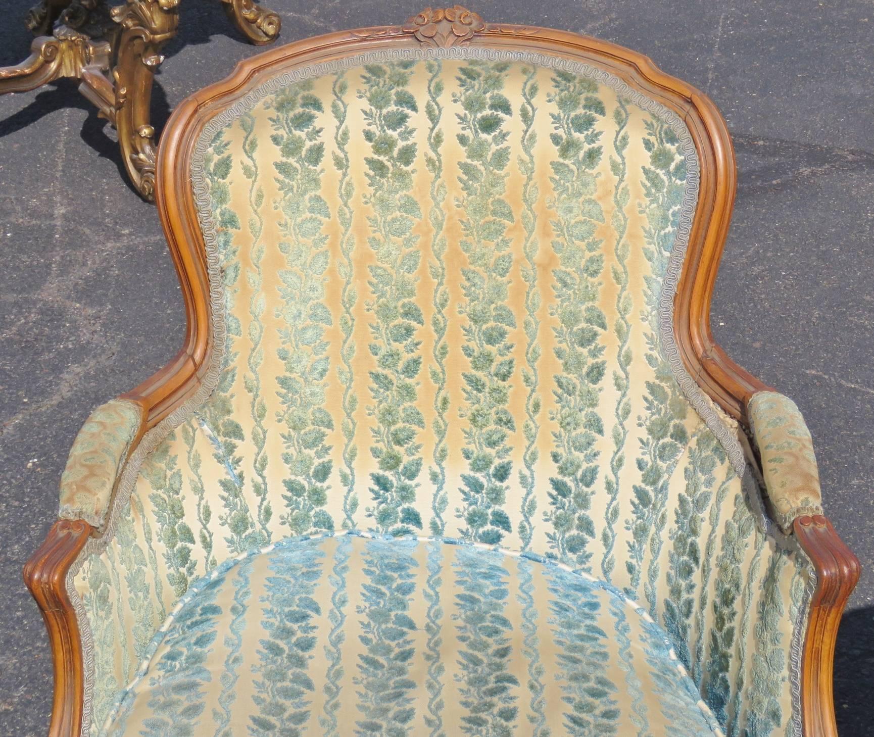 20th Century Pair of Louis XVI Style Walnut Carved Upholstered Bergere Chairs 