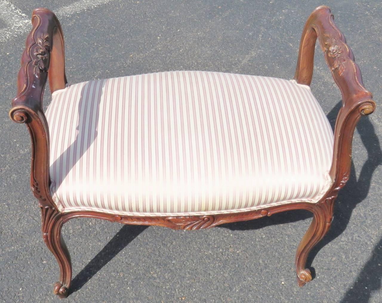 Walnut carved frame. Striped upholstered seat.