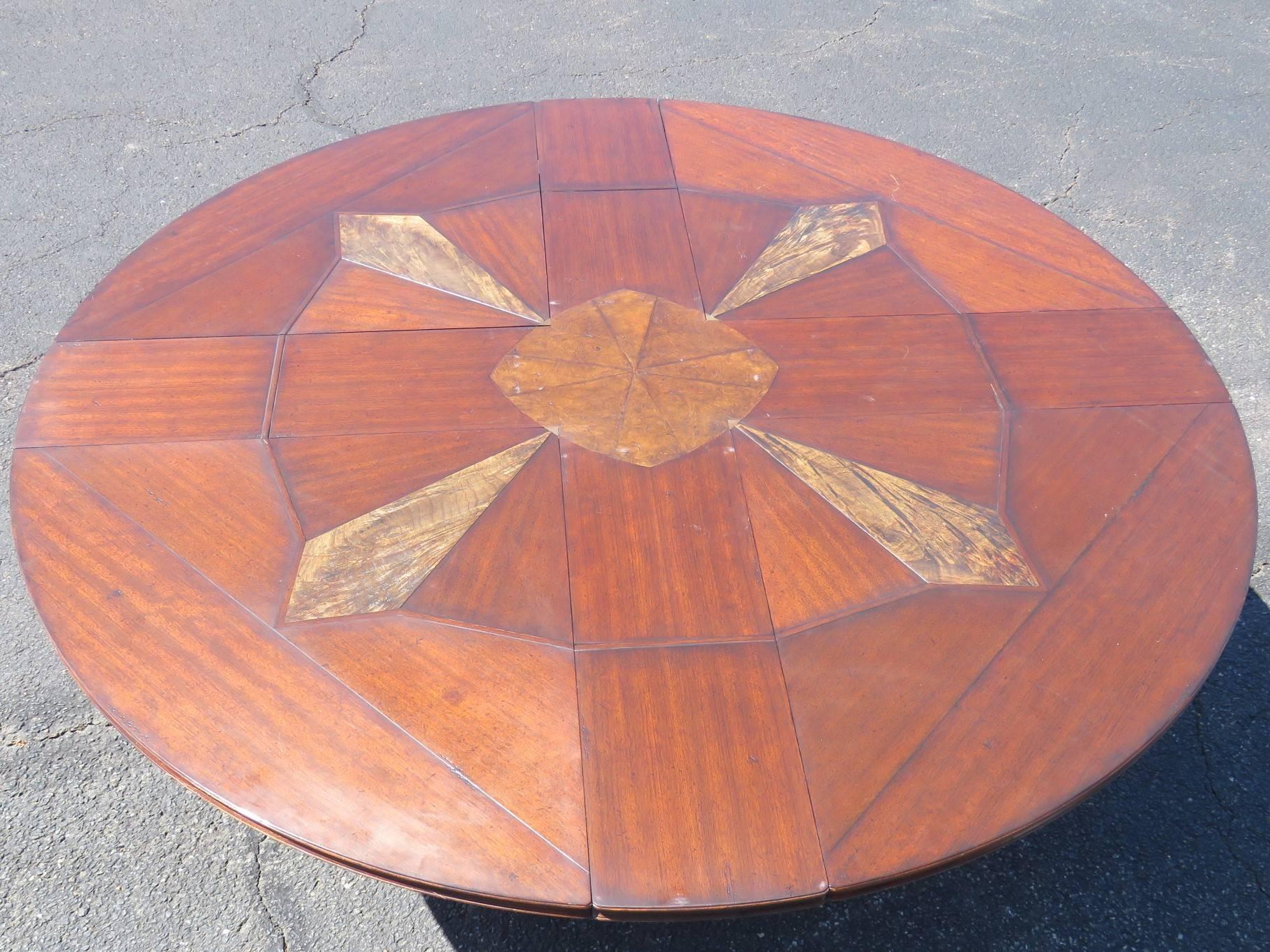 Inlaid top with carved base. Mechanical top spins to access lower boards.  73 3/4