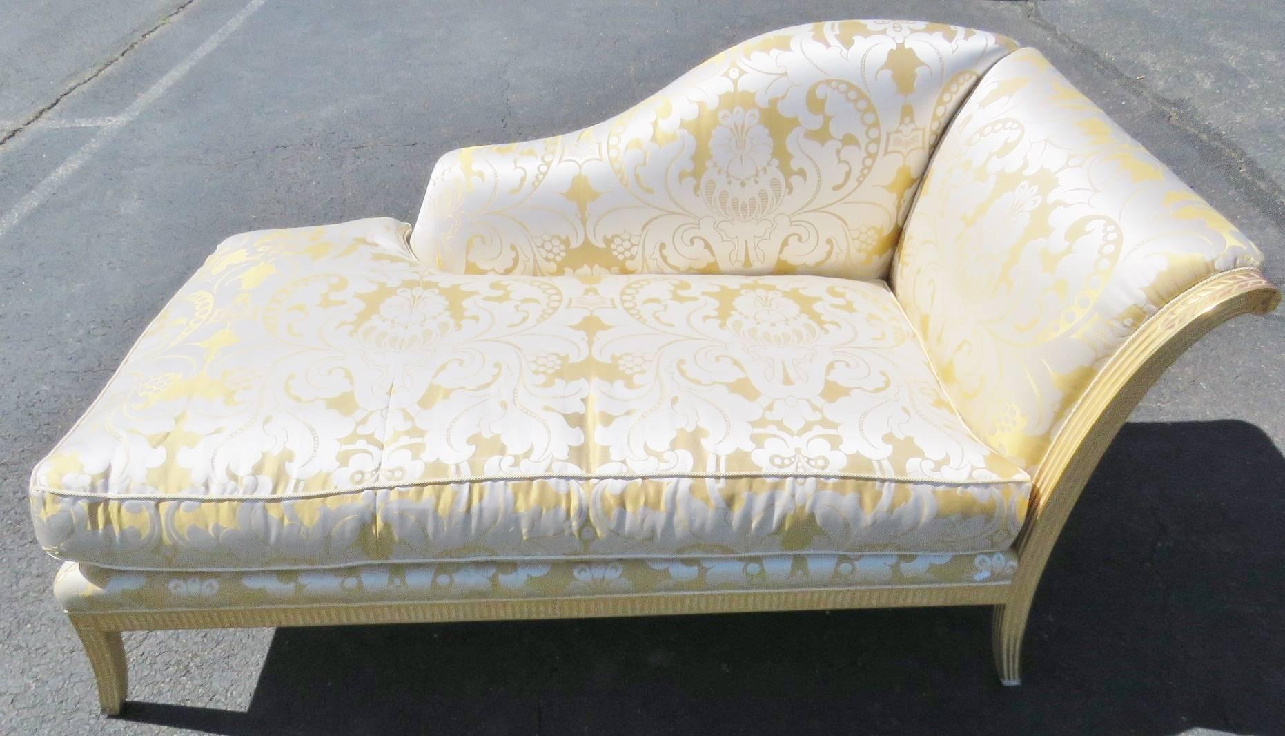 Gilt and cream painted carved frame. Damask upholstery.