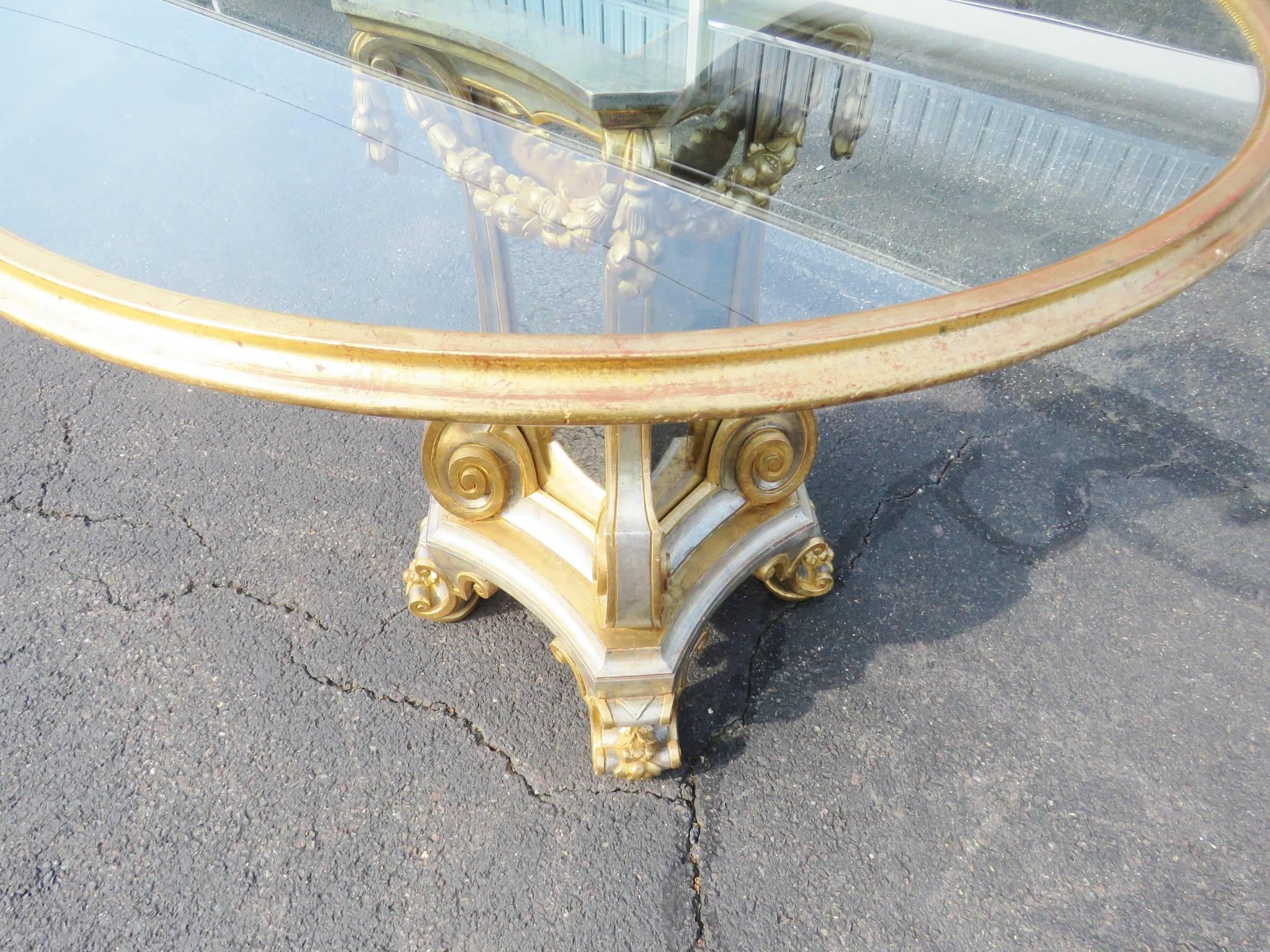 This is a beautiful table. Featuring Silver and gold leaf finish and mirrored panels, This table will reflect not only your excellent taste in furniture but the rest of the surrounding areas of your home. The table is opulent and extremely