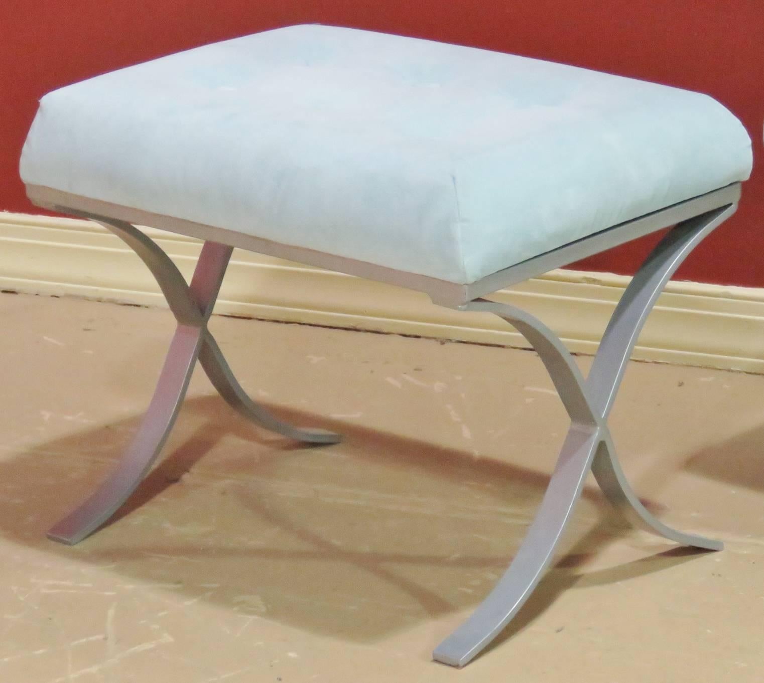 Gray painted metal frame. Blue tufted upholstered seat.