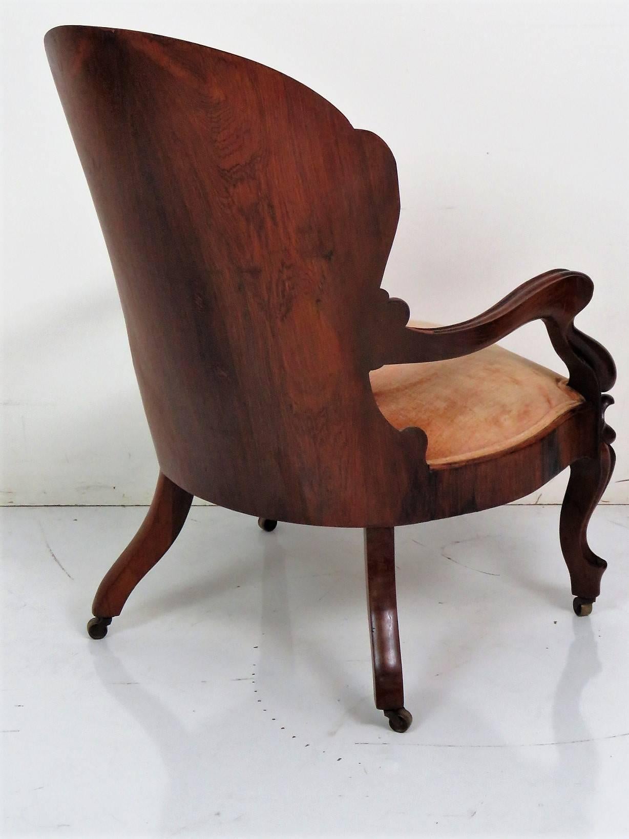 Walnut laminate frame. Orange upholstery. Would look great matched with our gentleman's chair VMD1361.
