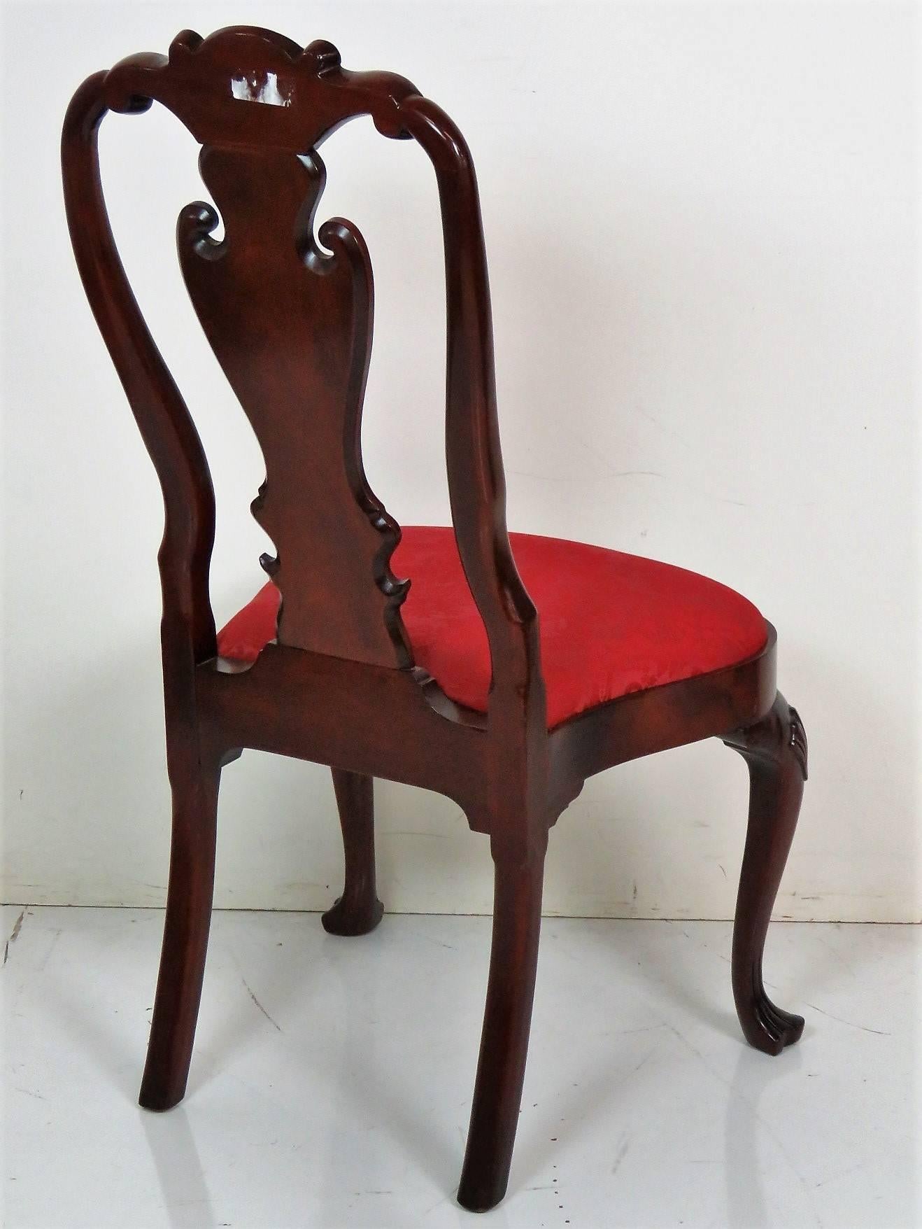 Ten Mahogany Carved Upholstered Dining Chairs 1