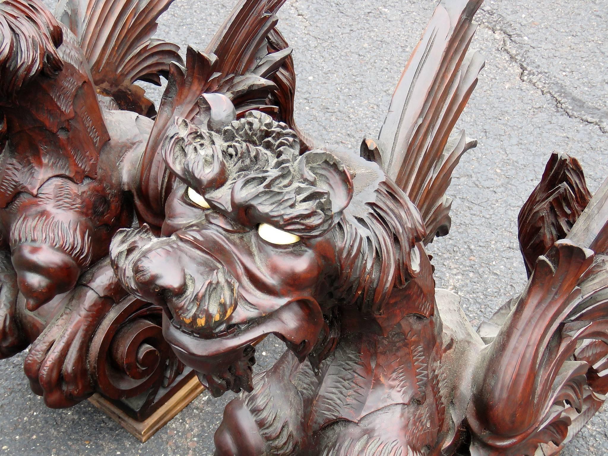 Pair of Magnificent Figural Carved Griffins 1