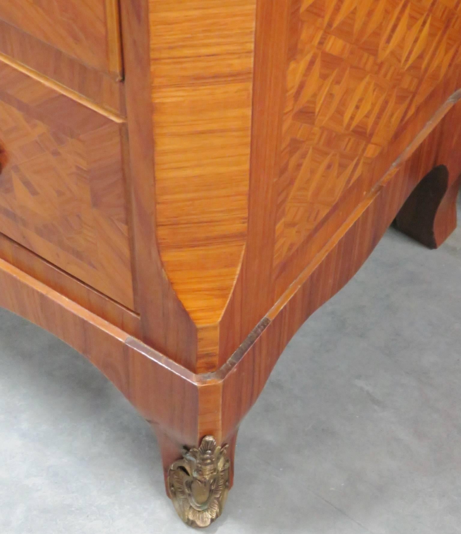 Marble-top. Parquetry inlaid frame. Bronze mounts and hardware.