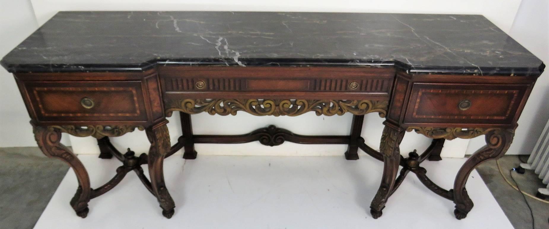 Marble-top. Gilt highlights. Inlaid drawers.