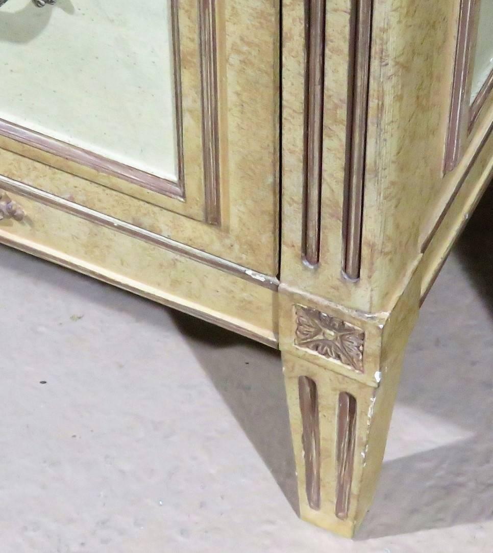 Distressed cream and beige painted frame. Metal hardware.