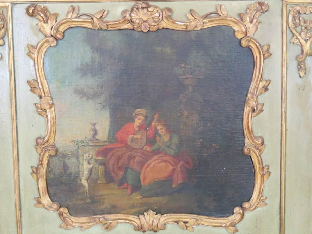 Distressed green paint with gilt carvings. Oil painting of serenade.