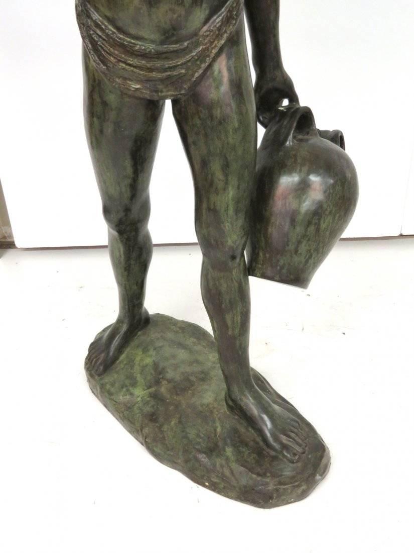 Unsigned. Bronze sculpture of a boy with a jug. Measure 66".