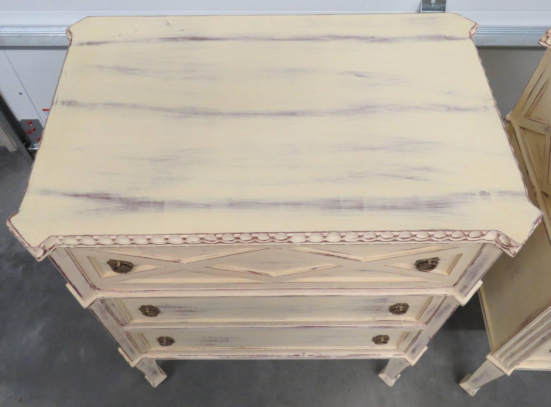 Pair Louis XVI Style Distressed Cream Painted Three-Drawer Chests In Good Condition In Swedesboro, NJ