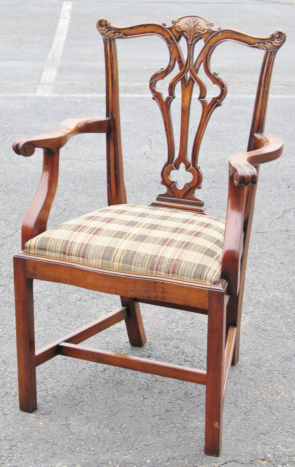 Carved frames. Striped upholstered seats. Set includes two armchairs and six side chairs.