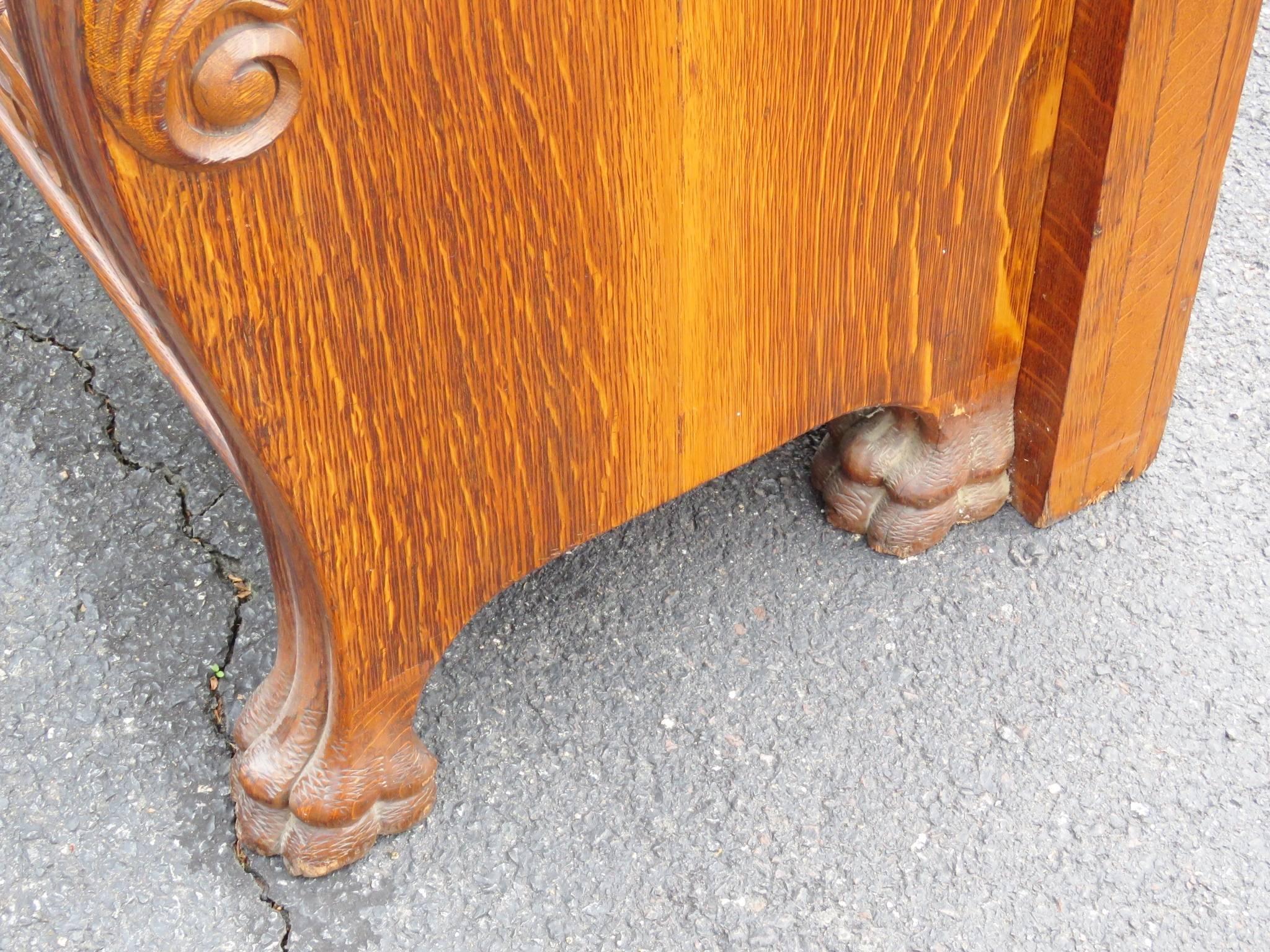 R.J. Horner Oak Carved Hall Seat with Lion's Heads For Sale at 1stDibs